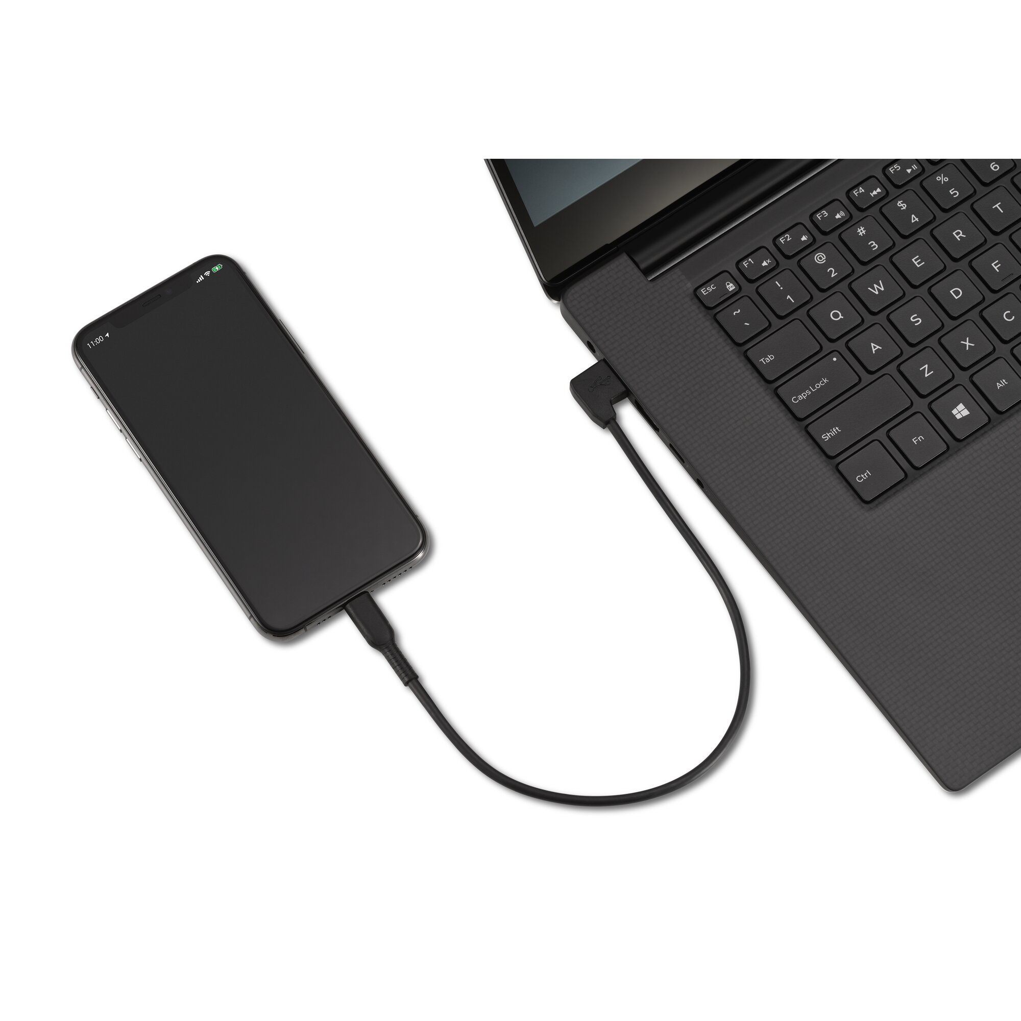 Czarny smartfon jest podłączony do czarnego laptopa za pomocą kabla.