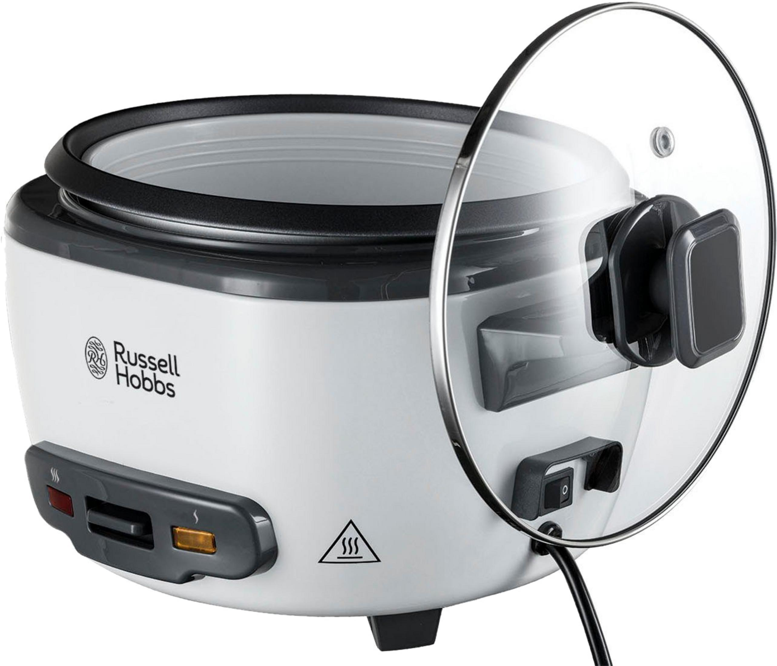 Una cuoci riso Russell Hobbs bianca con coperchio in vetro e controlli.