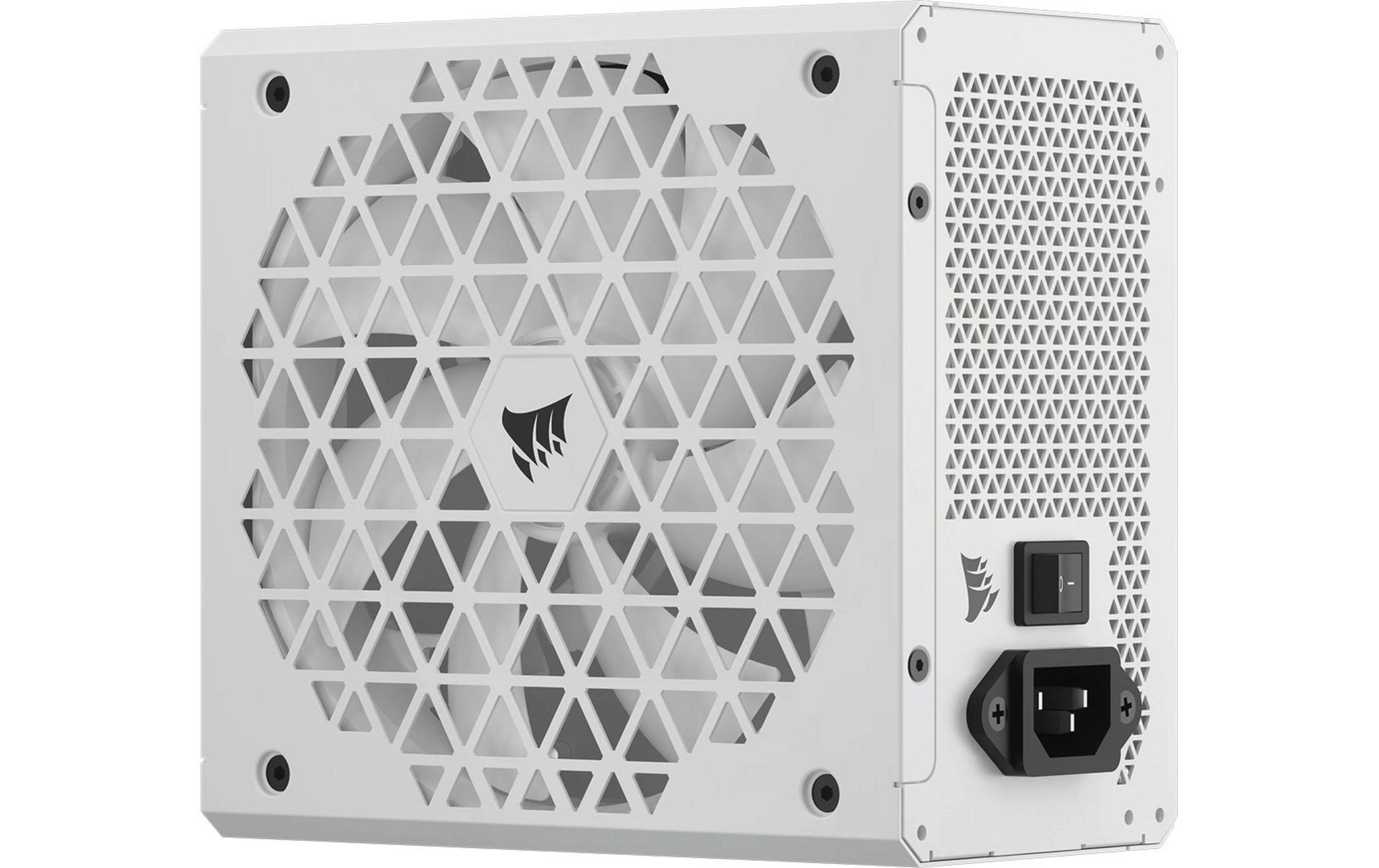 Biały zasilacz z trójkątną kratką wentylatora i złączem zasilania.