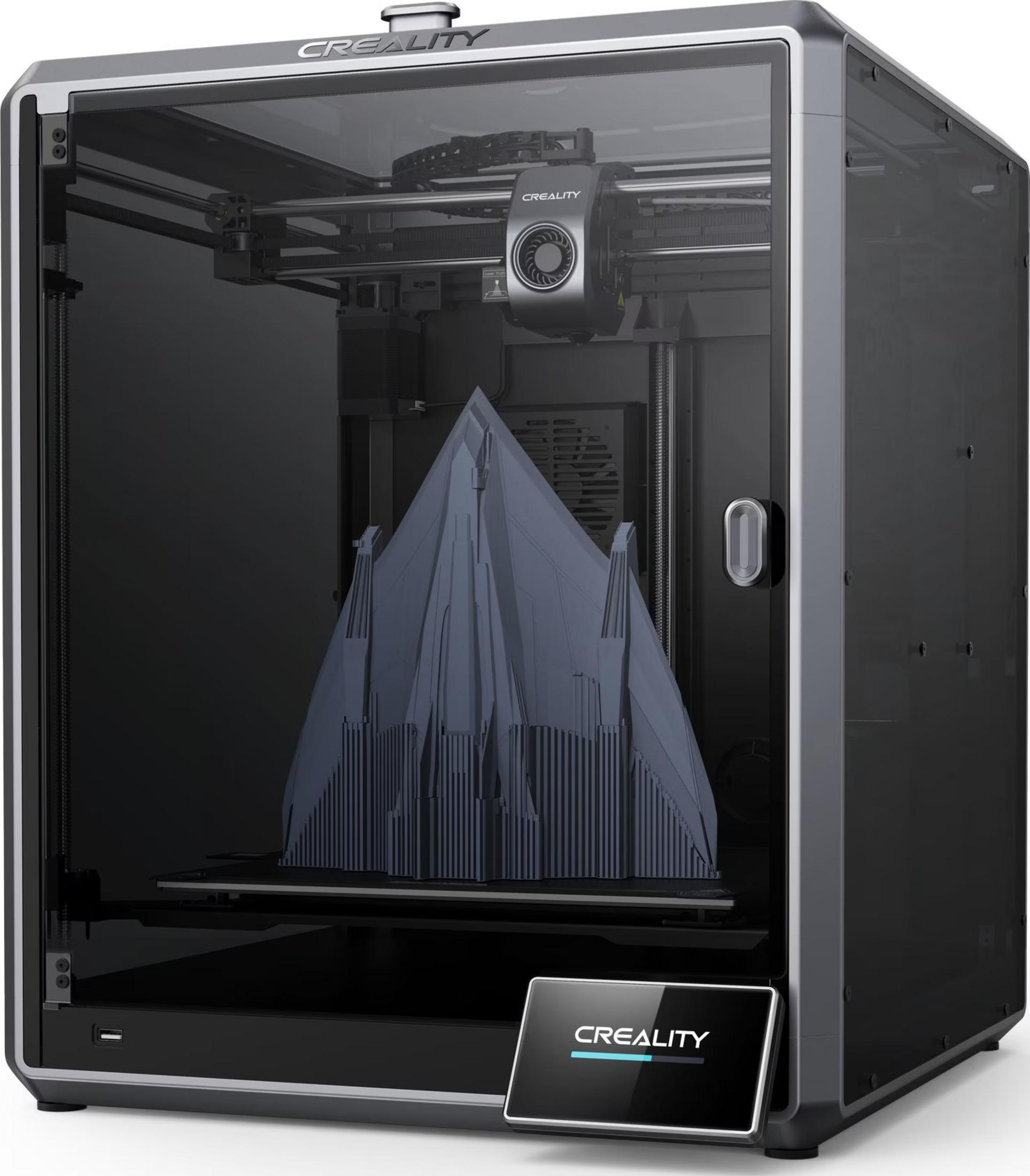 Ein 3D-Drucker mit einem grauen Modell im Inneren.