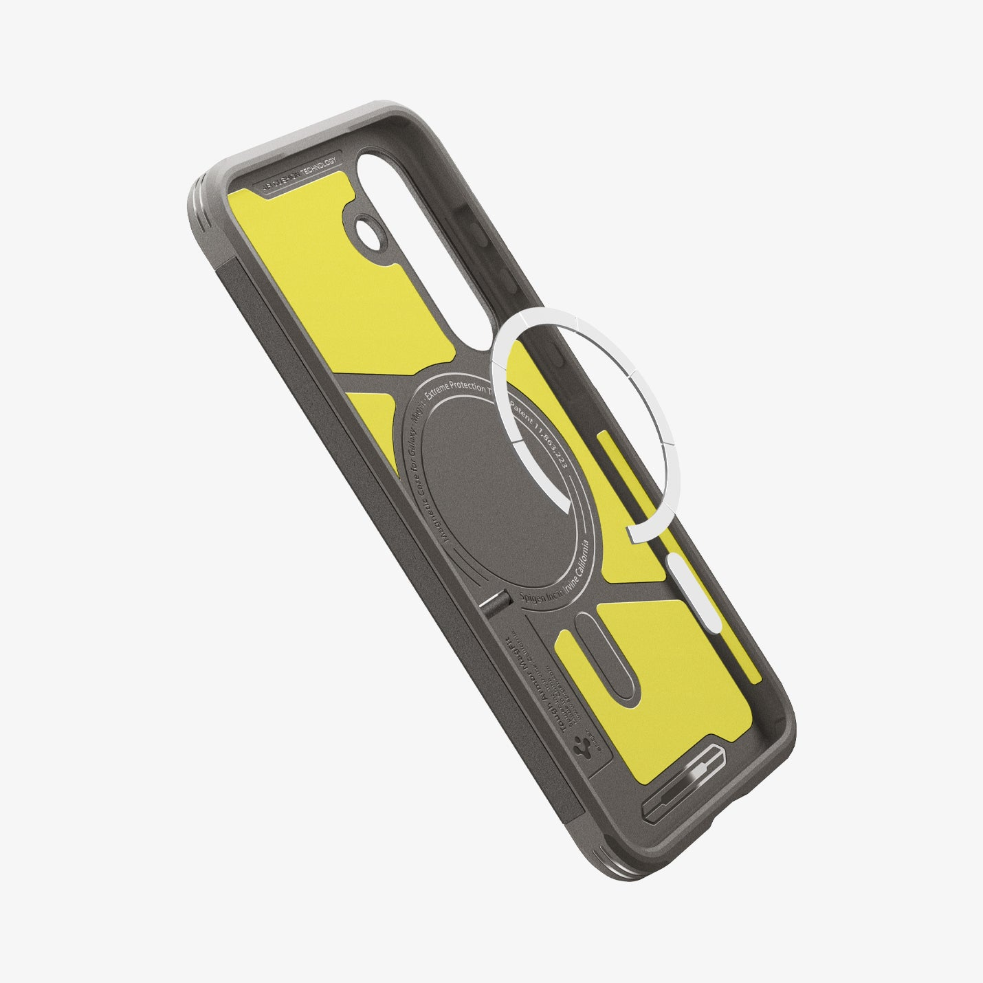 Coque de téléphone grise avec accents jaunes et anneau magnétique, Spigen Tough Armor MagFit.