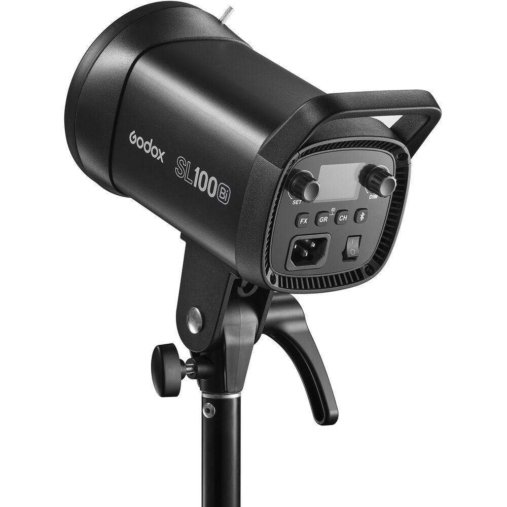 Lampe Godox SL100Bi noire avec écran et commandes, montée sur un trépied.