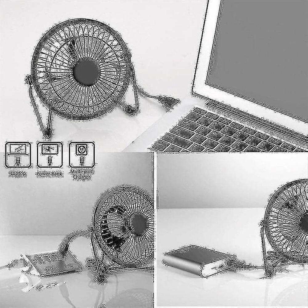 Ein kleiner USB-Ventilator neben einem Laptop und einer Powerbank.