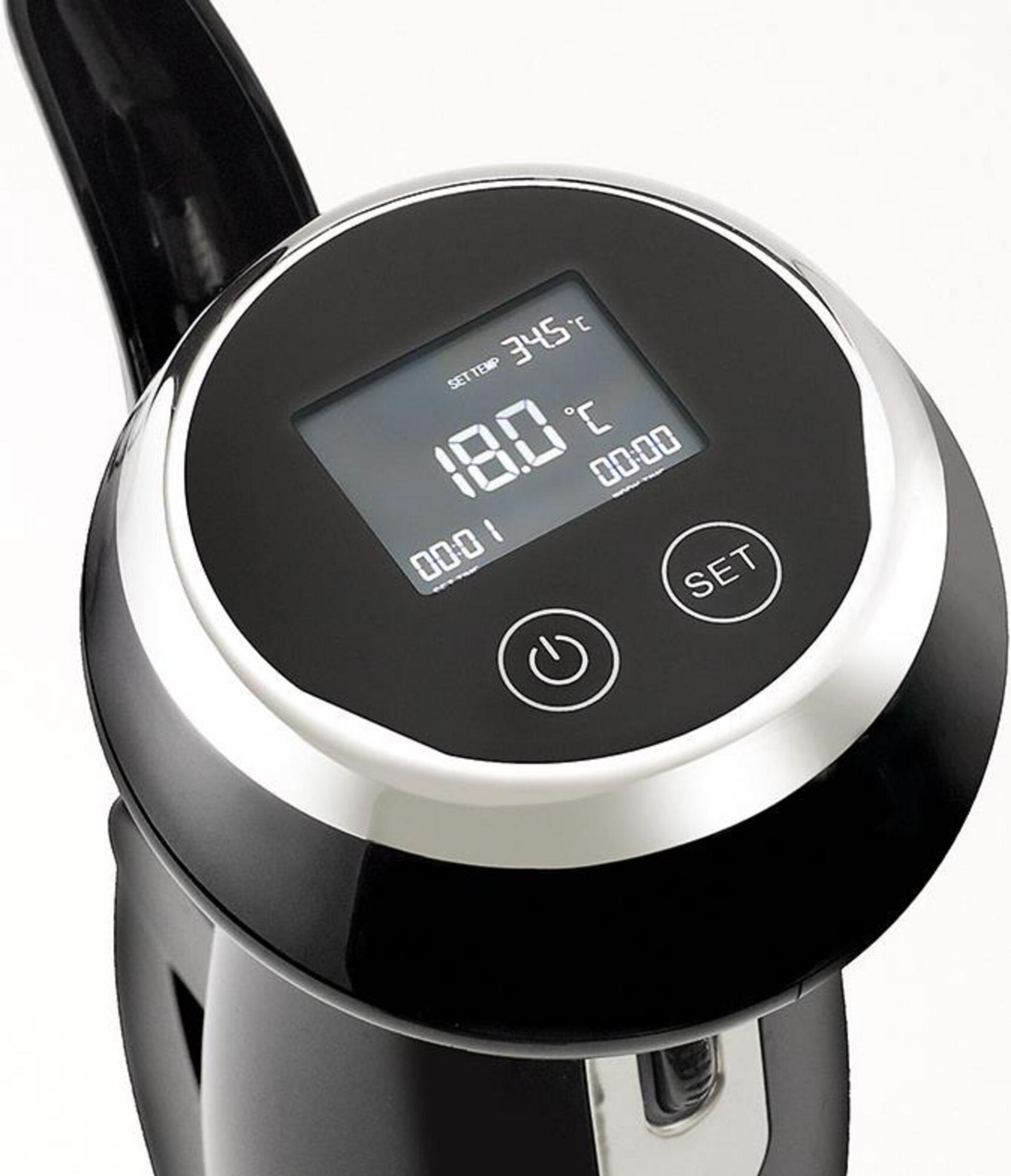 Un appareil noir avec écran numérique affiche 18,0°C et 00:00.