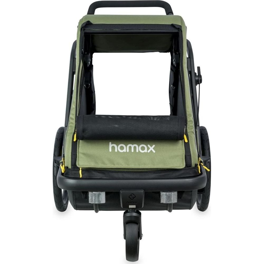 Ein grüner Hamax Kinderwagen mit schwarzem Dach und Rädern.