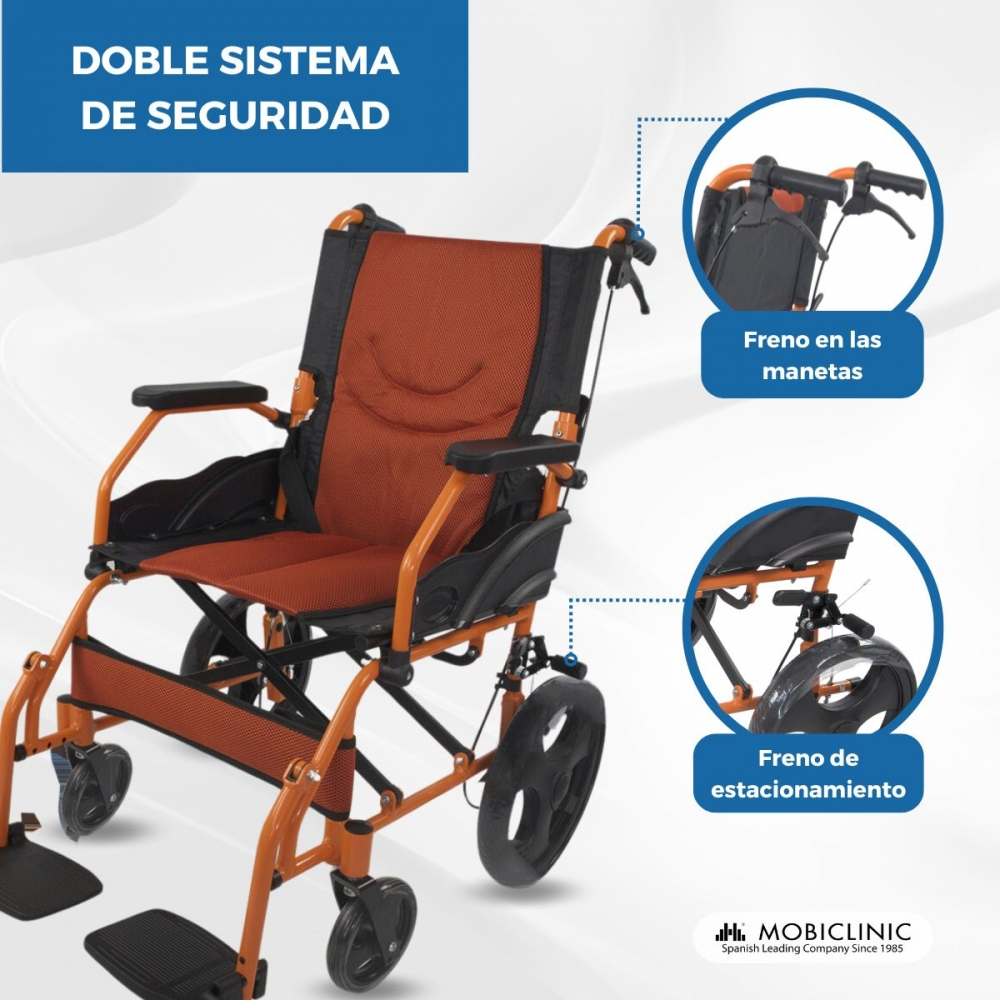 Silla de ruedas naranja con frenos en manetas y frenos de estacionamiento.