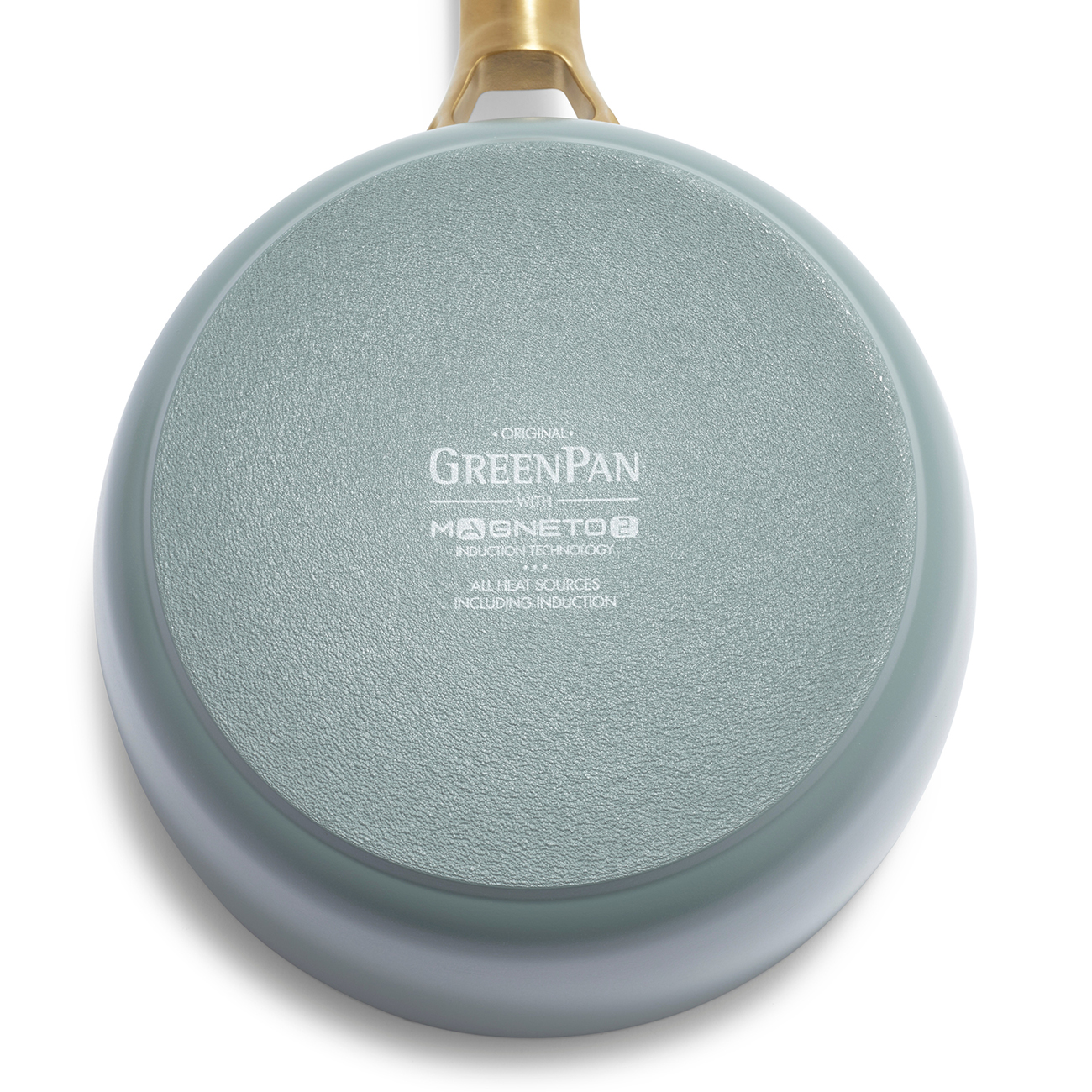 Die Unterseite einer hellgrünen Pfanne mit goldenem Griff und "GreenPan"-Logo.