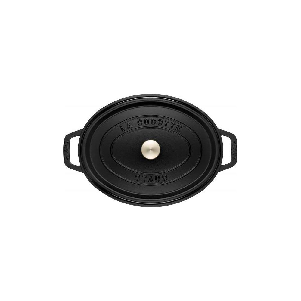 Cocotte ovale noire Staub avec inscription "La Cocotte" et "Staub".
