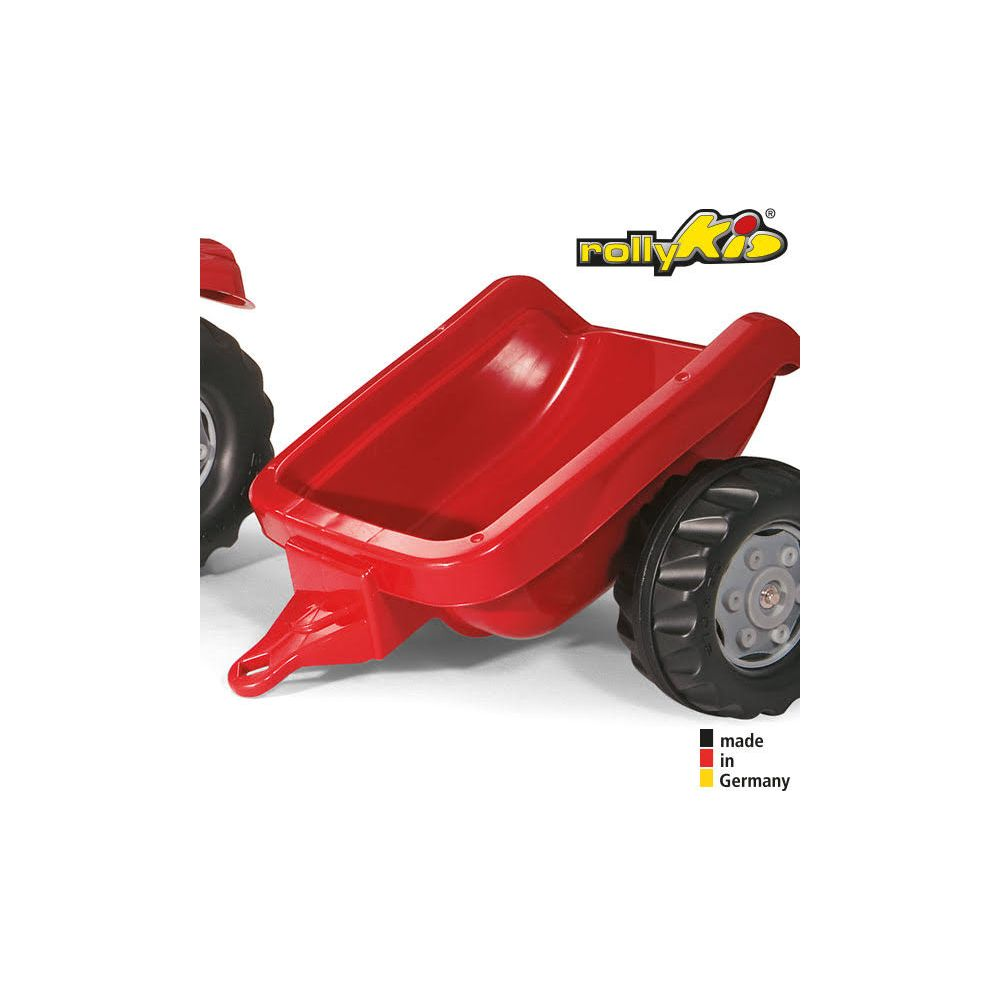 Ein roter Spielzeuganhänger mit schwarzen Rädern und dem Rolly Toys Logo.