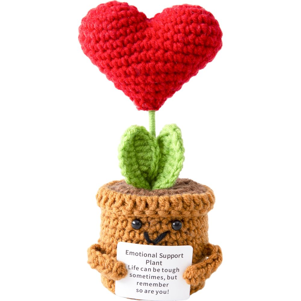 Plante au crochet avec cœur rouge tenant une pancarte : 'Plante de soutien émotionnel'
