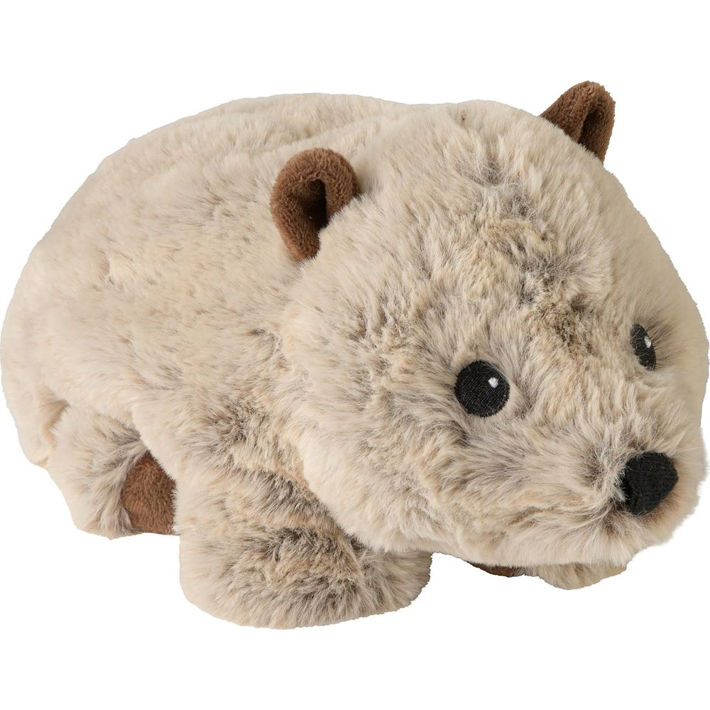 Ein beigefarbener Plüsch-Wombat mit braunen Ohren und Augen.