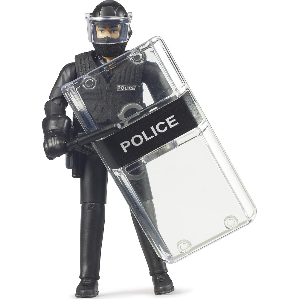 Eine schwarze Spielzeugpolizistenfigur in Riot-Ausrüstung hält einen durchsichtigen Schild mit der Aufschrift 'POLICE'.