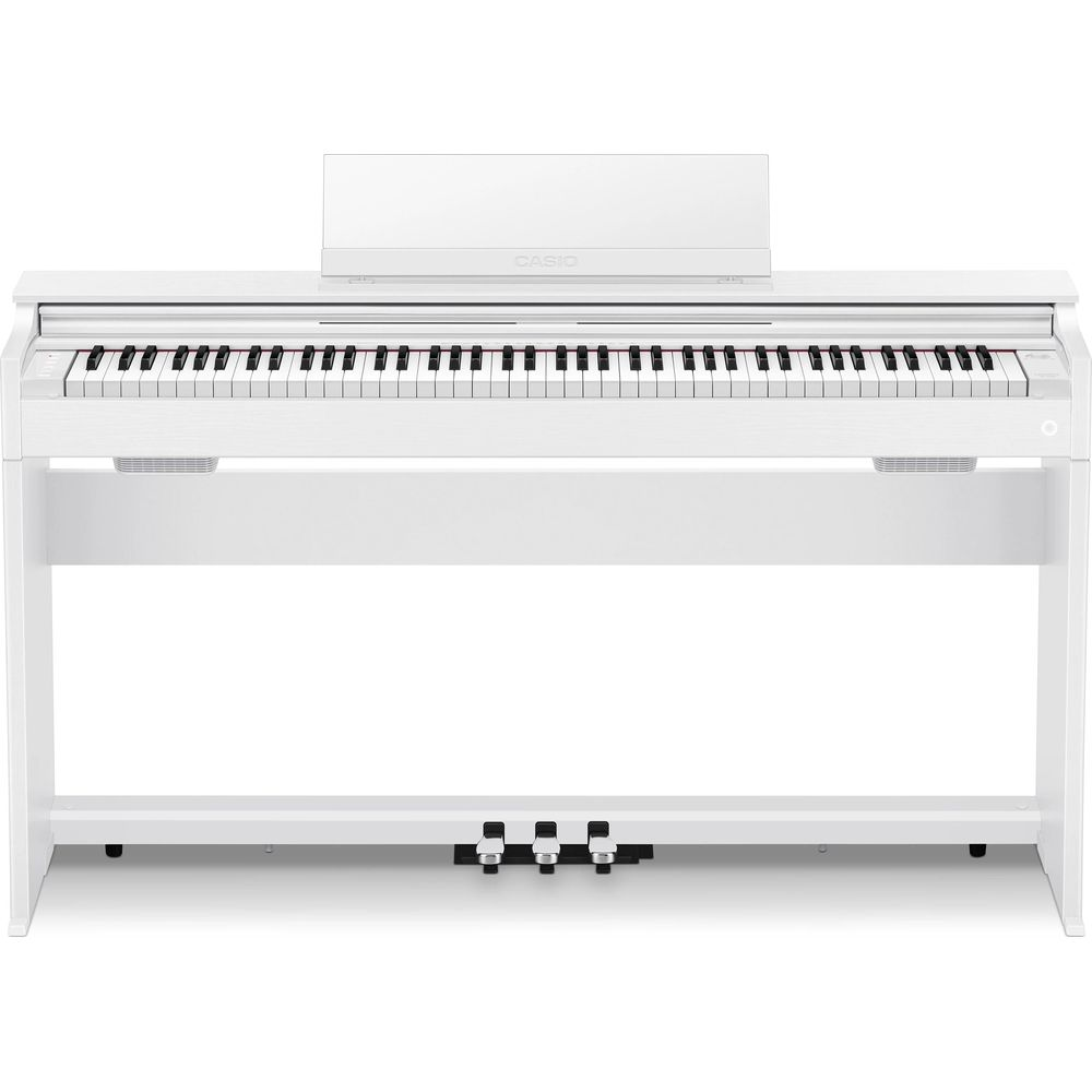 Un piano numérique blanc avec clavier, pupitre et trois pédales.