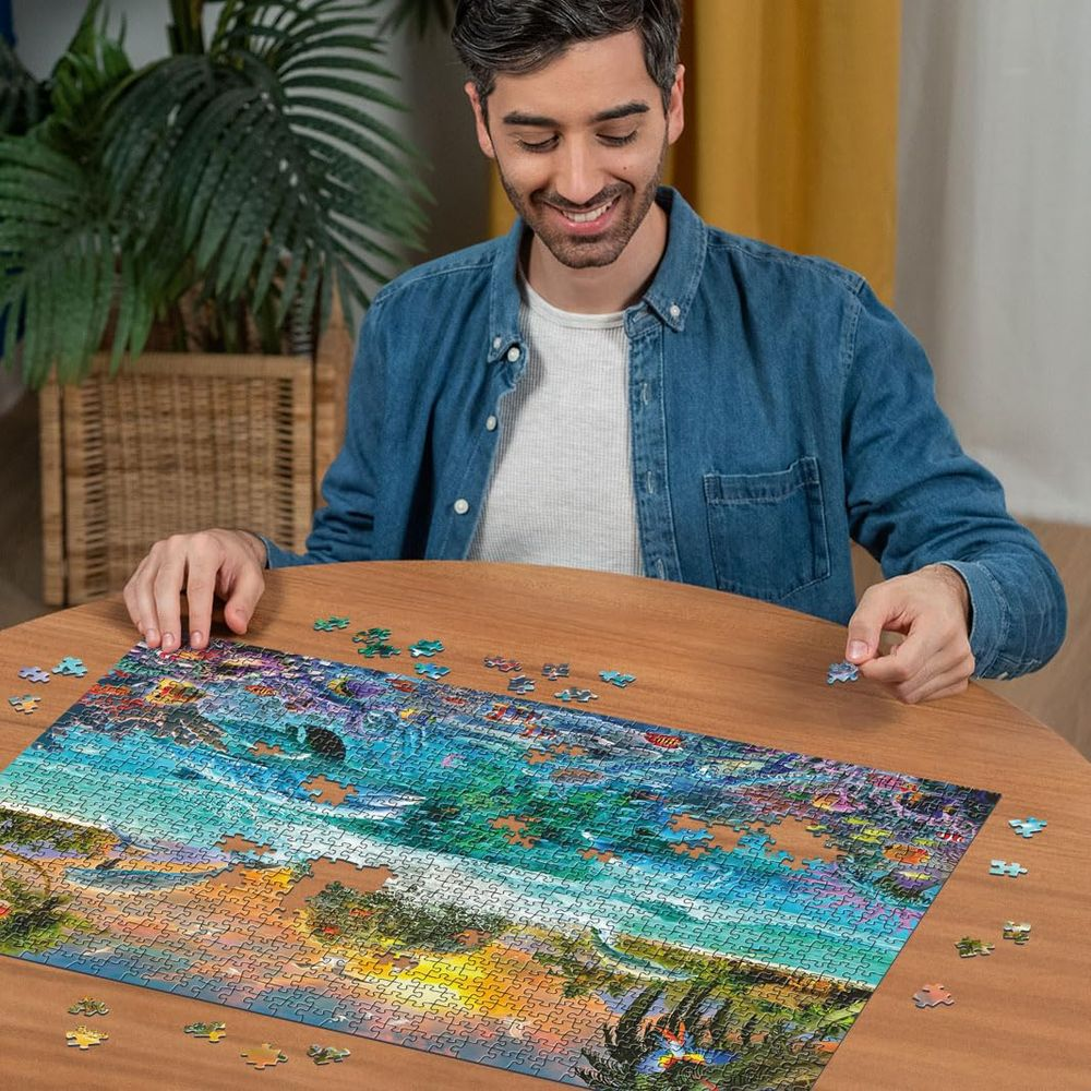 Homme place pièce de puzzle. Scène sous-marine colorée avec poissons et coraux.