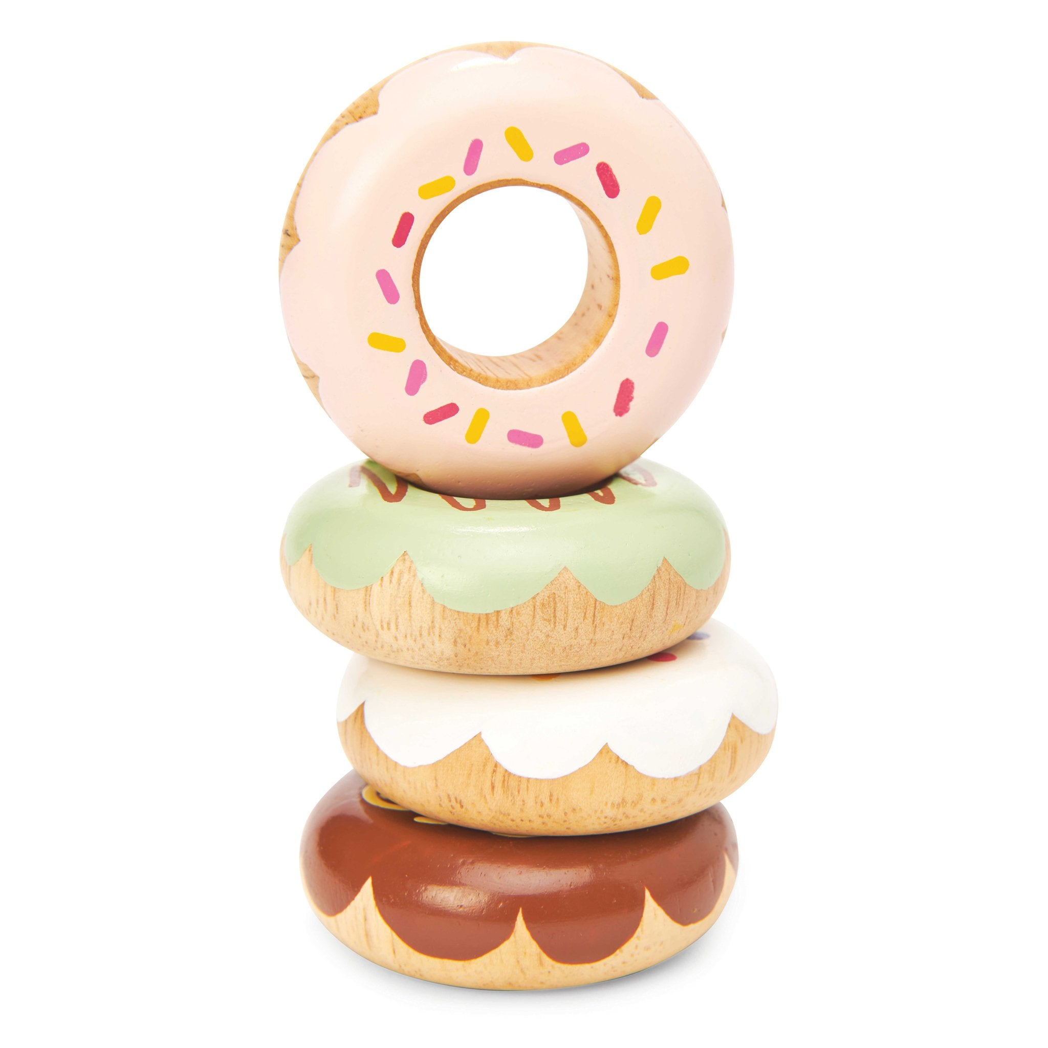 Vier Holz-Donuts stapeln sich, mit rosa, grüner, weißer und brauner Glasur.