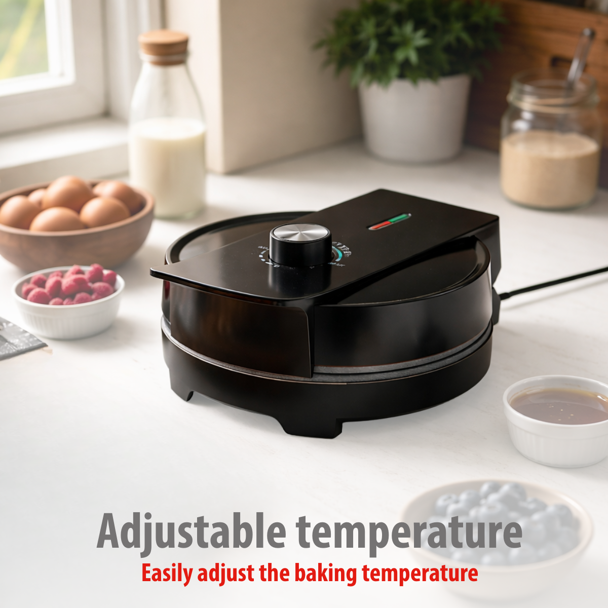 A black waffle maker with a temperature dial, next to eggs, berries, and milk.