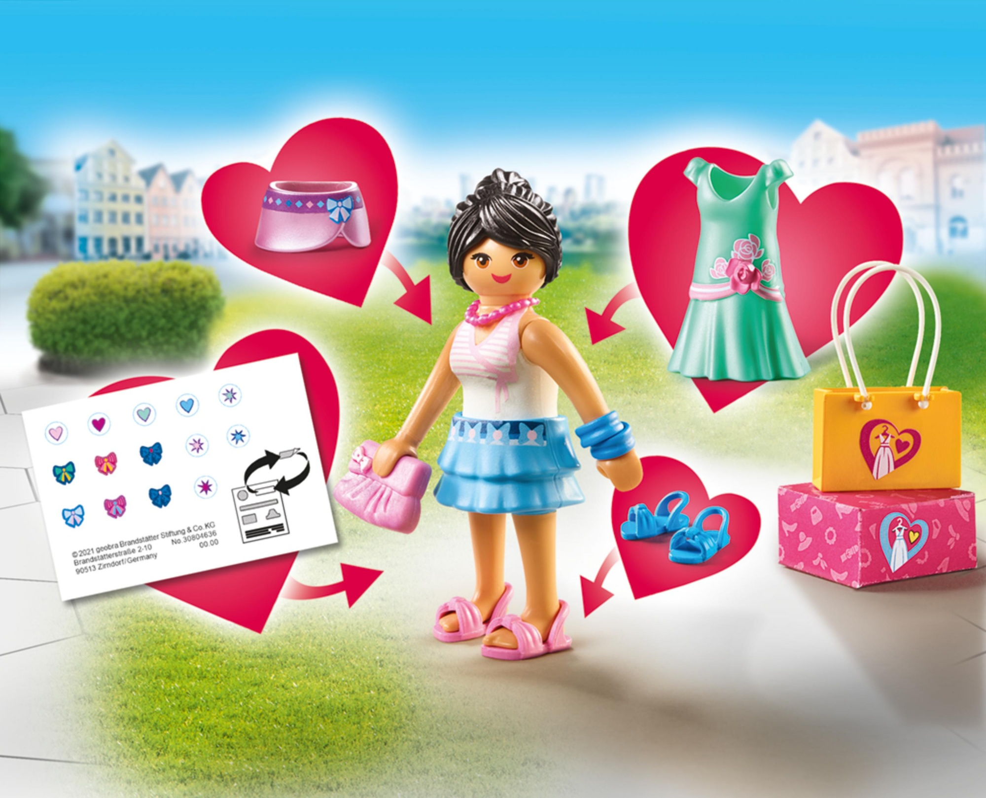 Kalplerle çevrili, kıyafetleri, ayakkabıları ve çantası olan Playmobil figür.