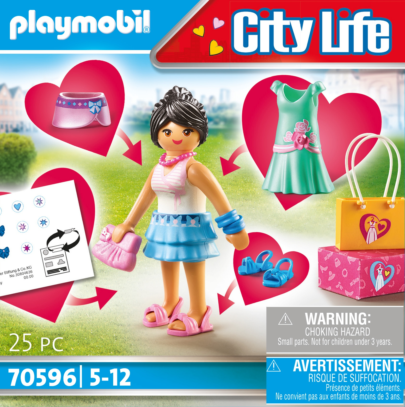 Playmobil figürü, giysi ve aksesuarlar, uyarı etiketi ile.