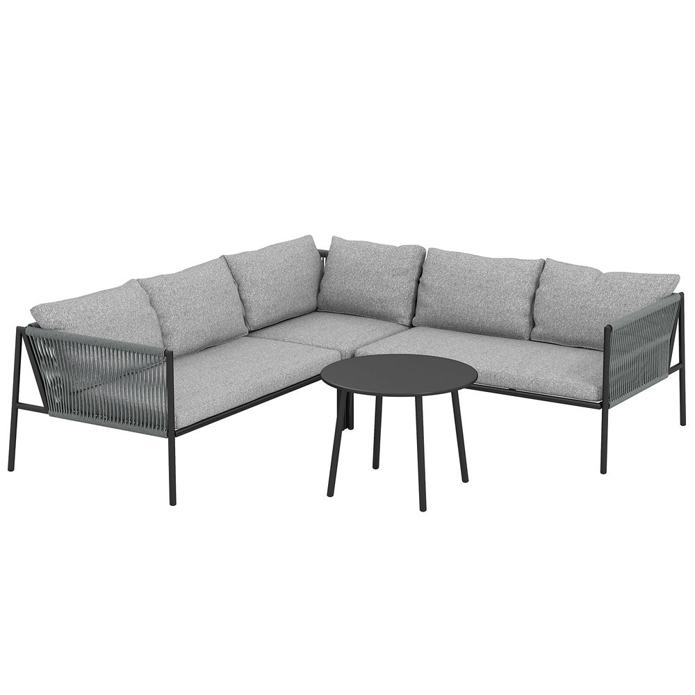 Sofá modular gris con cojines y una mesa de centro redonda sobre estructura metálica negra.