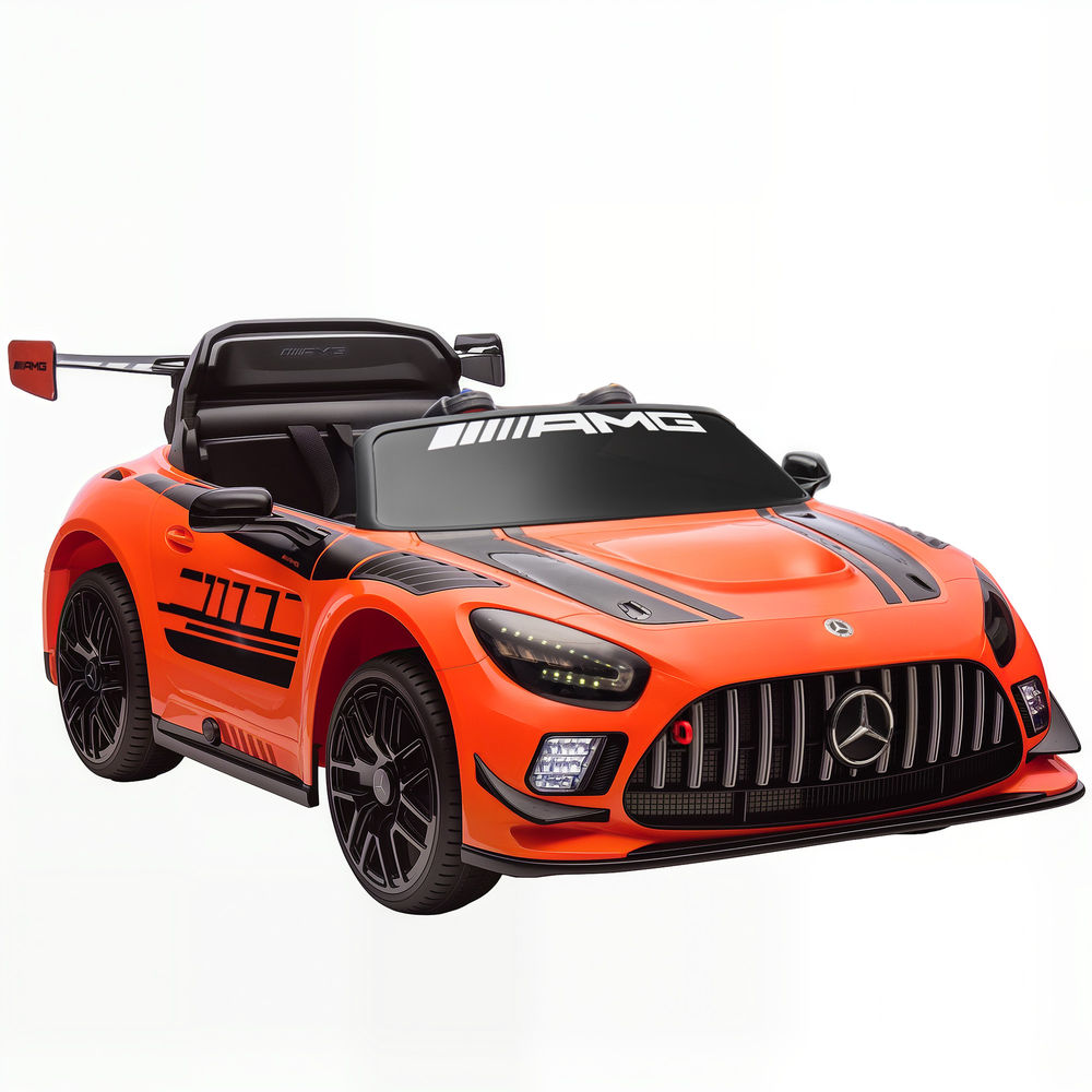 Un coche deportivo de juguete naranja con detalles negros y alerón trasero.