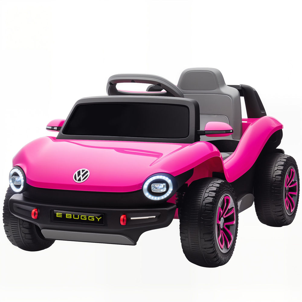 Un buggy infantil rosa con llantas y neumáticos negros, logo VW delante.