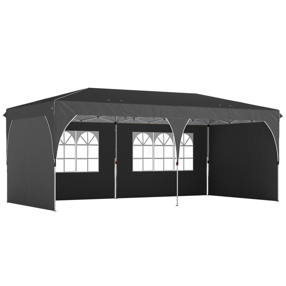 Una carpa gris oscura con ventanas arqueadas y ribete blanco sobre fondo blanco.