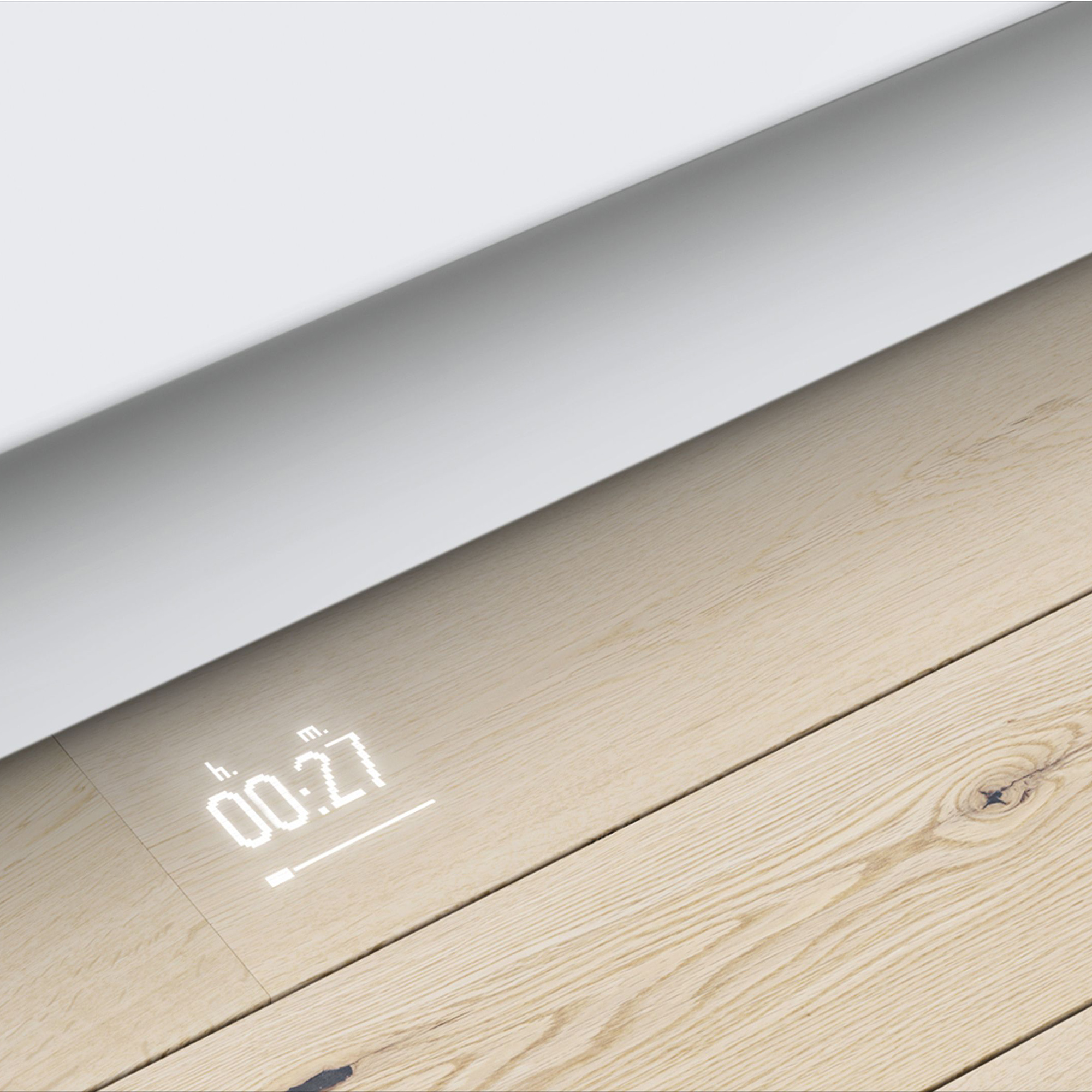 Ein digitaler Timer mit 00:27 auf einem Holzboden.