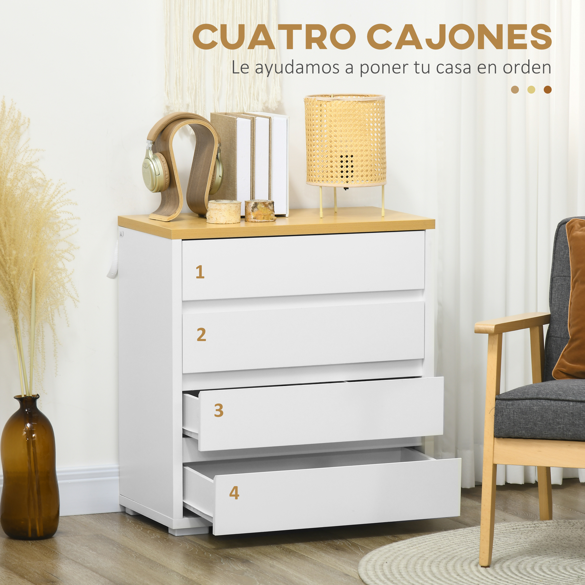 Cómoda blanca de cuatro cajones con tapa de madera, audífonos, lámpara.
