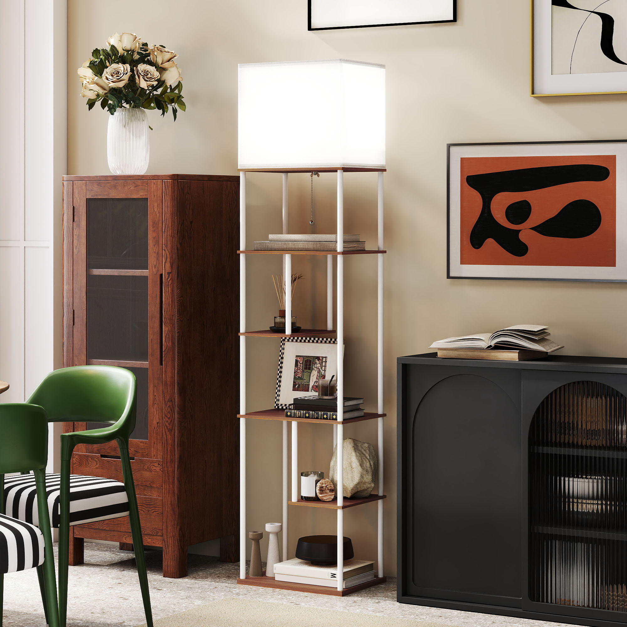 Una sala de estar con muebles de madera, sillas verdes, un estante y arte en la pared.