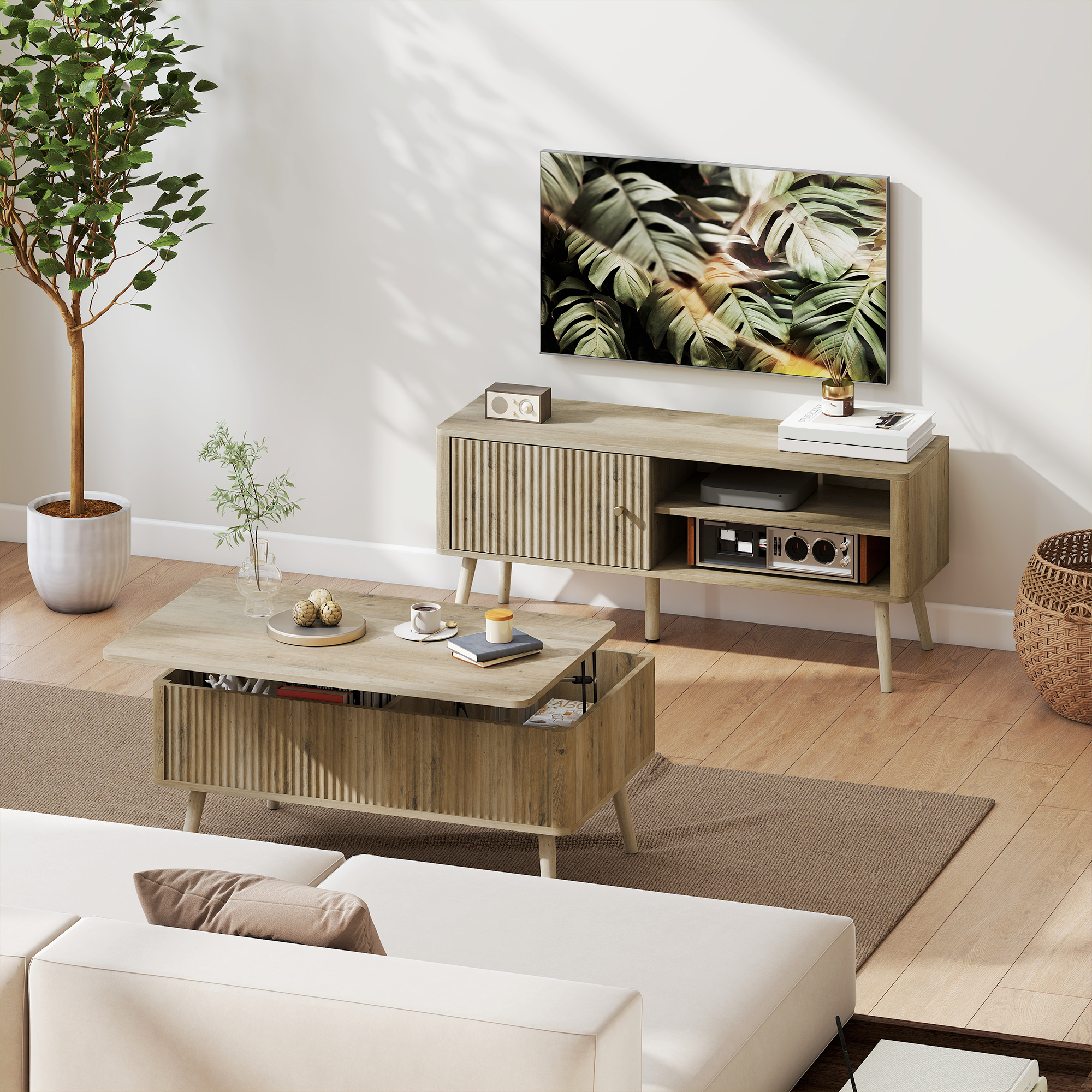 Sala de estar moderna con sofá, mesa de centro, TV y planta.