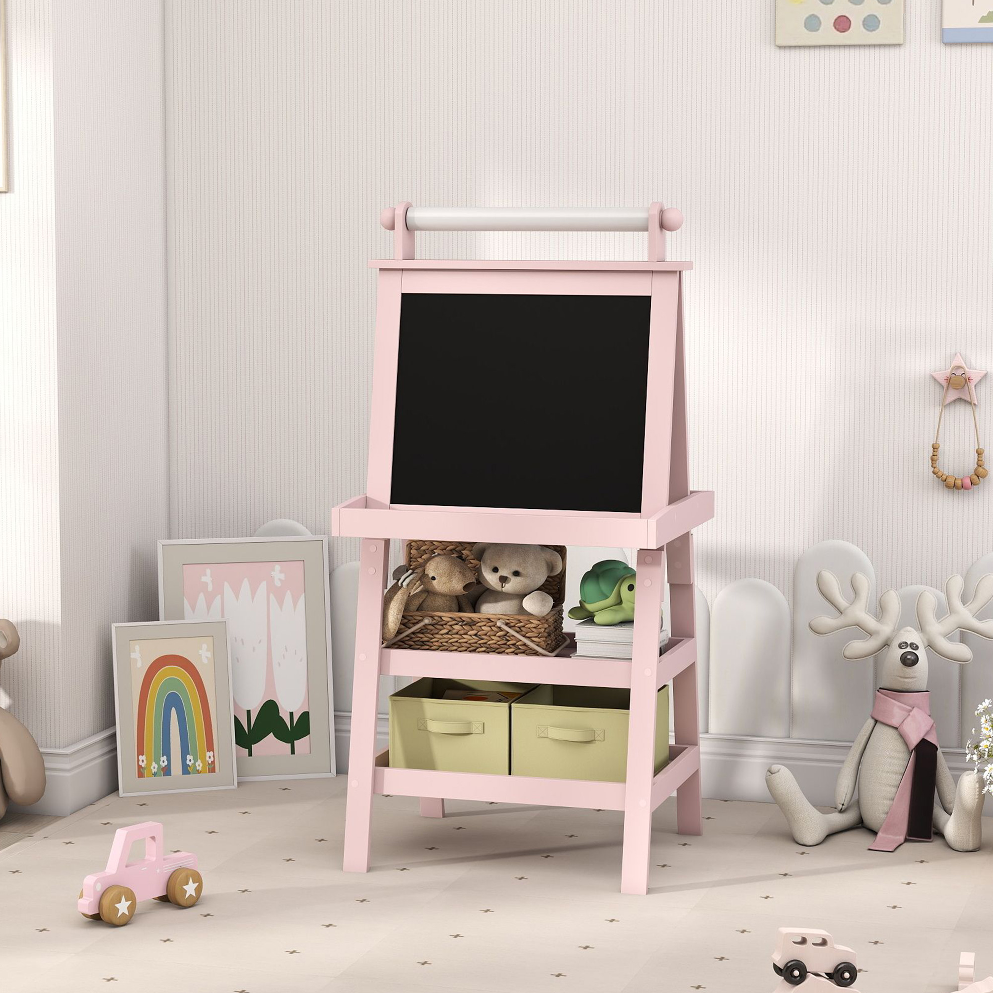 Un caballete infantil rosa con pizarra, juguetes y cajas de almacenamiento.