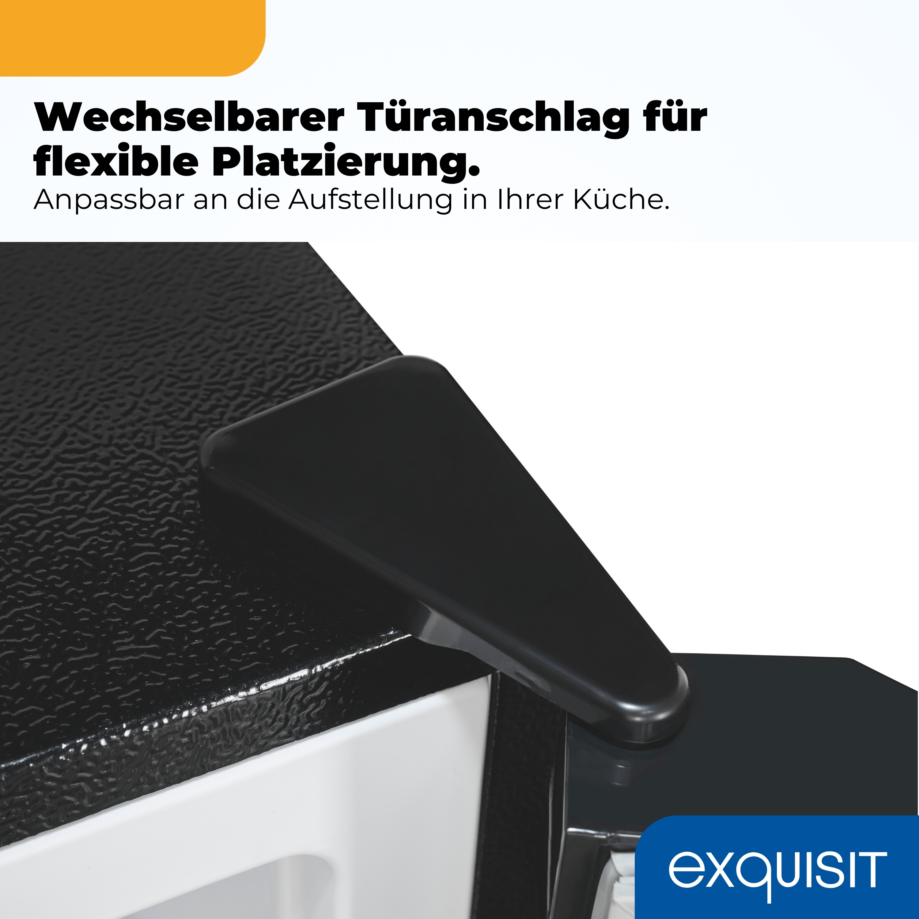 Nahaufnahme eines schwarzen Kühlschrankgriffs mit Text.