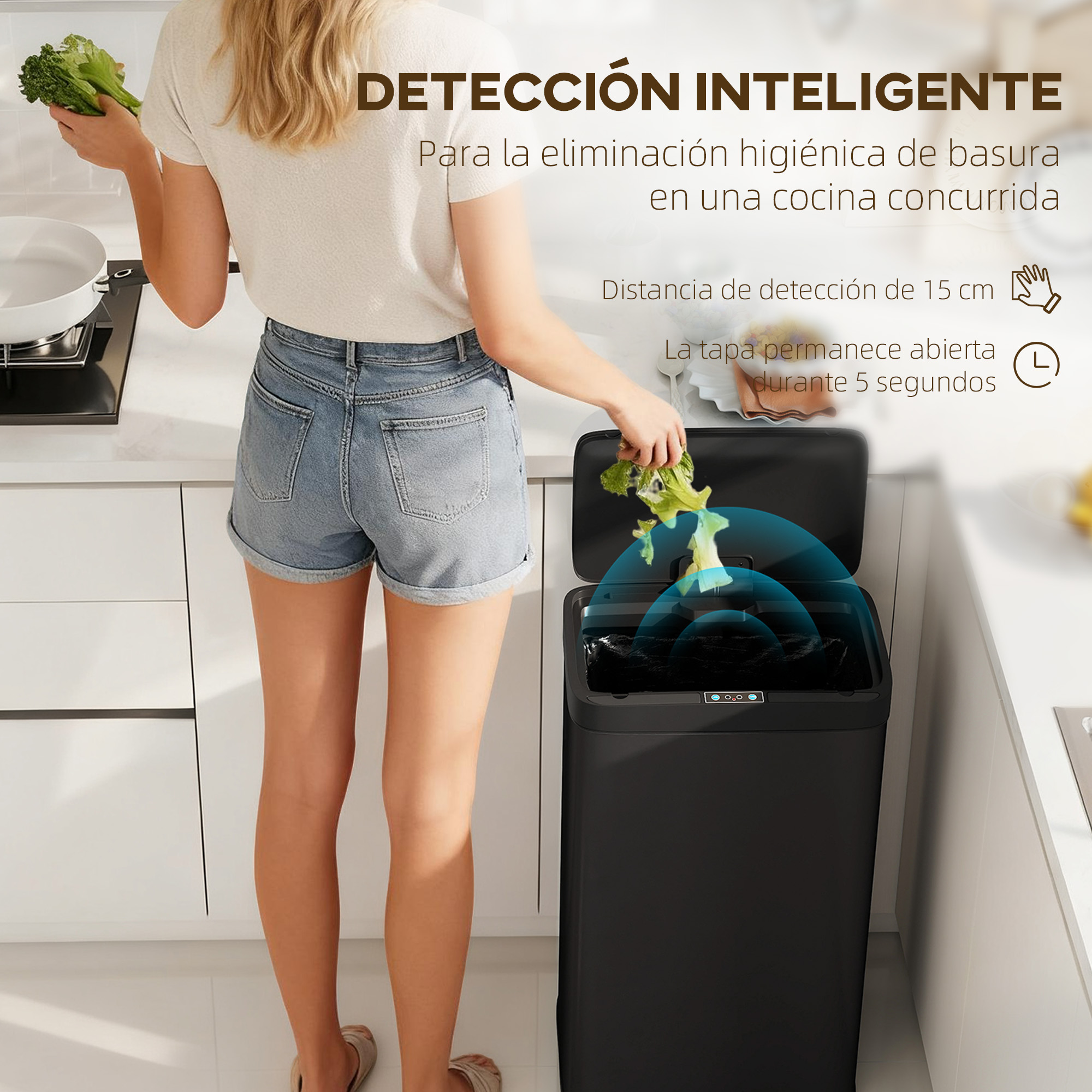 Una mujer tira brócoli en un cubo de basura negro con sensor.