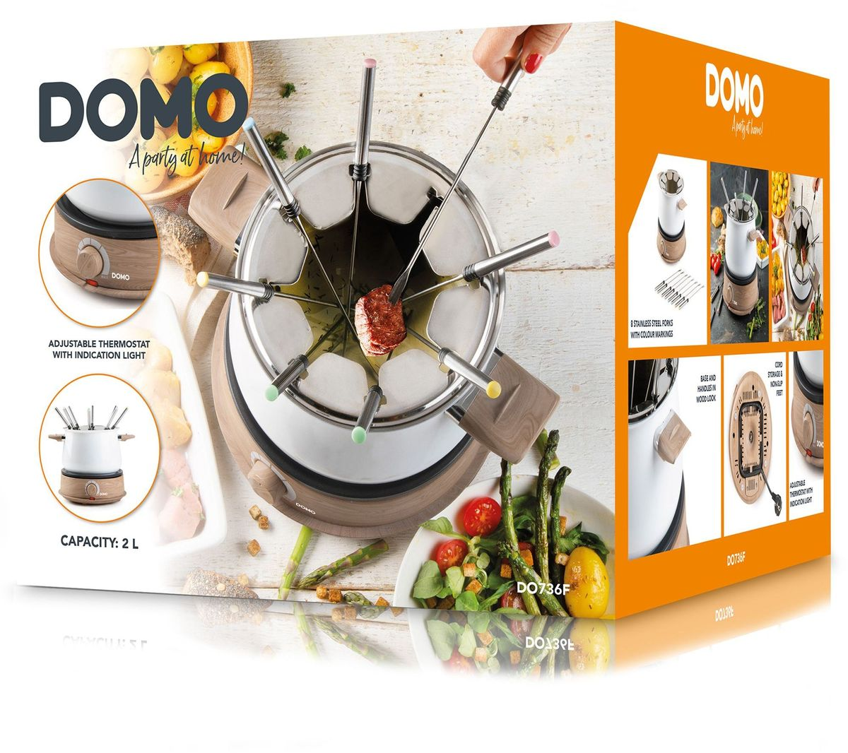 Ein Domo Fondue-Set mit Fleisch und Gemüse, bereit zum Servieren.