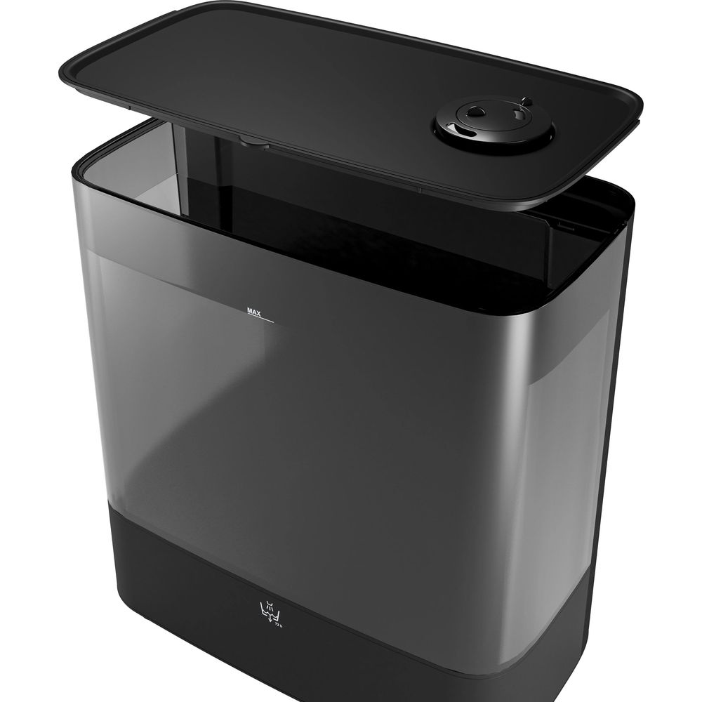 Un umidificatore nero rettangolare con serbatoio trasparente e coperchio nero rimosso.