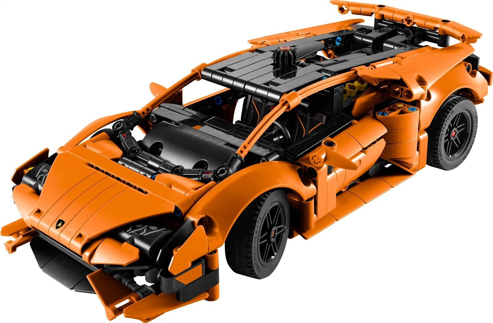 Orange Lego Technic Sportwagenmodell mit schwarzem Interieur und freiliegenden Motorteilen.