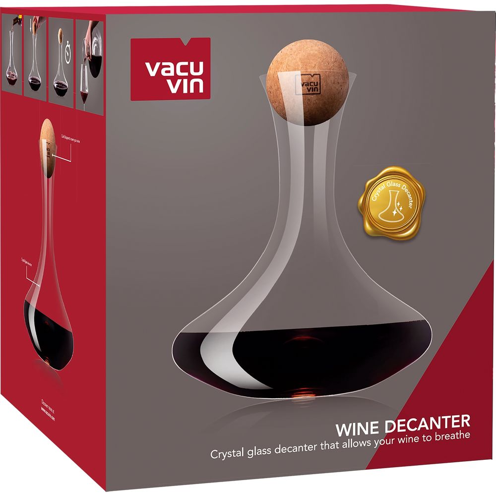 Caraffa in cristallo con tappo, riempita di vino rosso. Confezione prodotto.