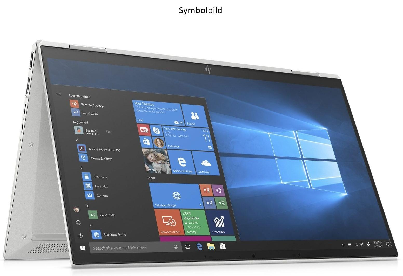 Ein silberner Laptop mit einer Windows 10-Oberfläche auf dem Bildschirm.