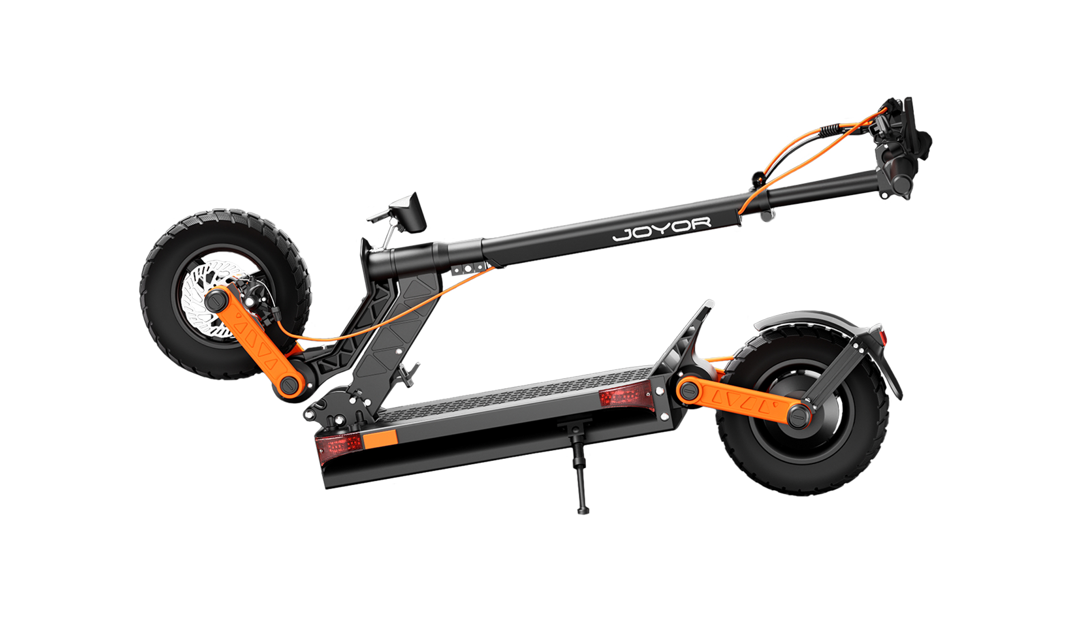 Uno scooter elettrico nero con accenti arancioni e pneumatici grandi.