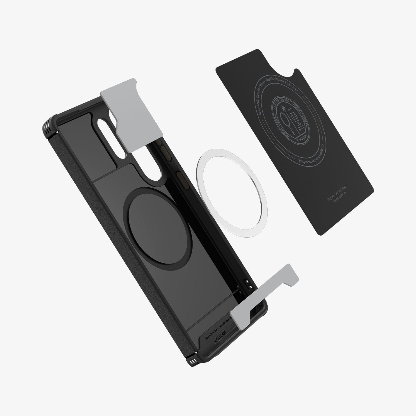 Eine schwarze Spigen-Handyhülle, ein Magnetring und ein Kartenhalter sind vor weißem Hintergrund abgebildet.