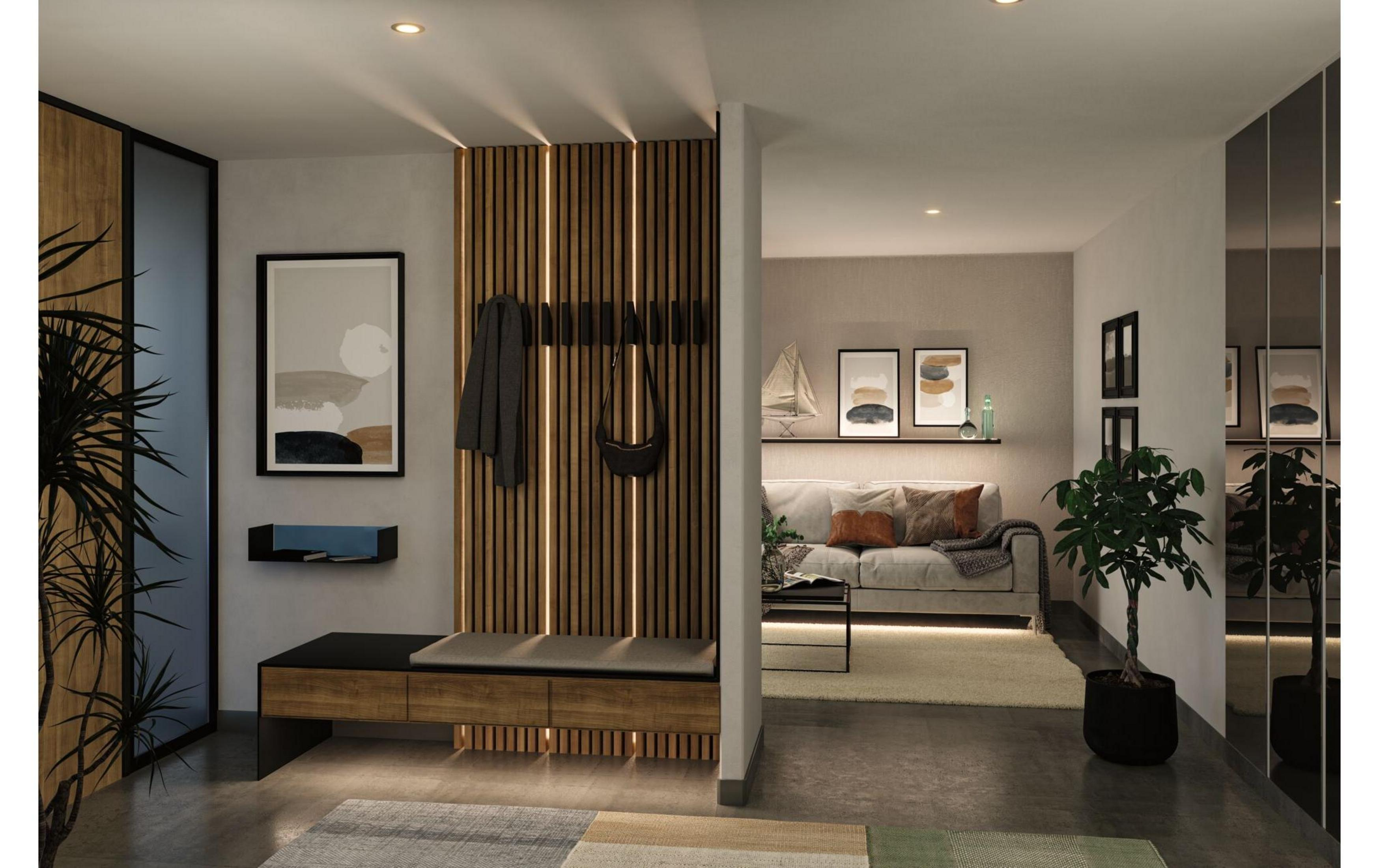 Przedpokój z ławką i wieszakiem, obok salon z sofą.