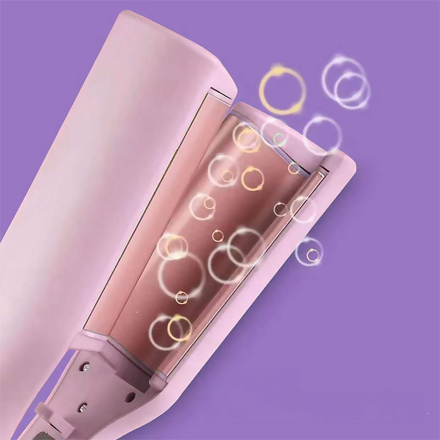 Un arricciacapelli rosa aperto con anelli scintillanti su sfondo viola.