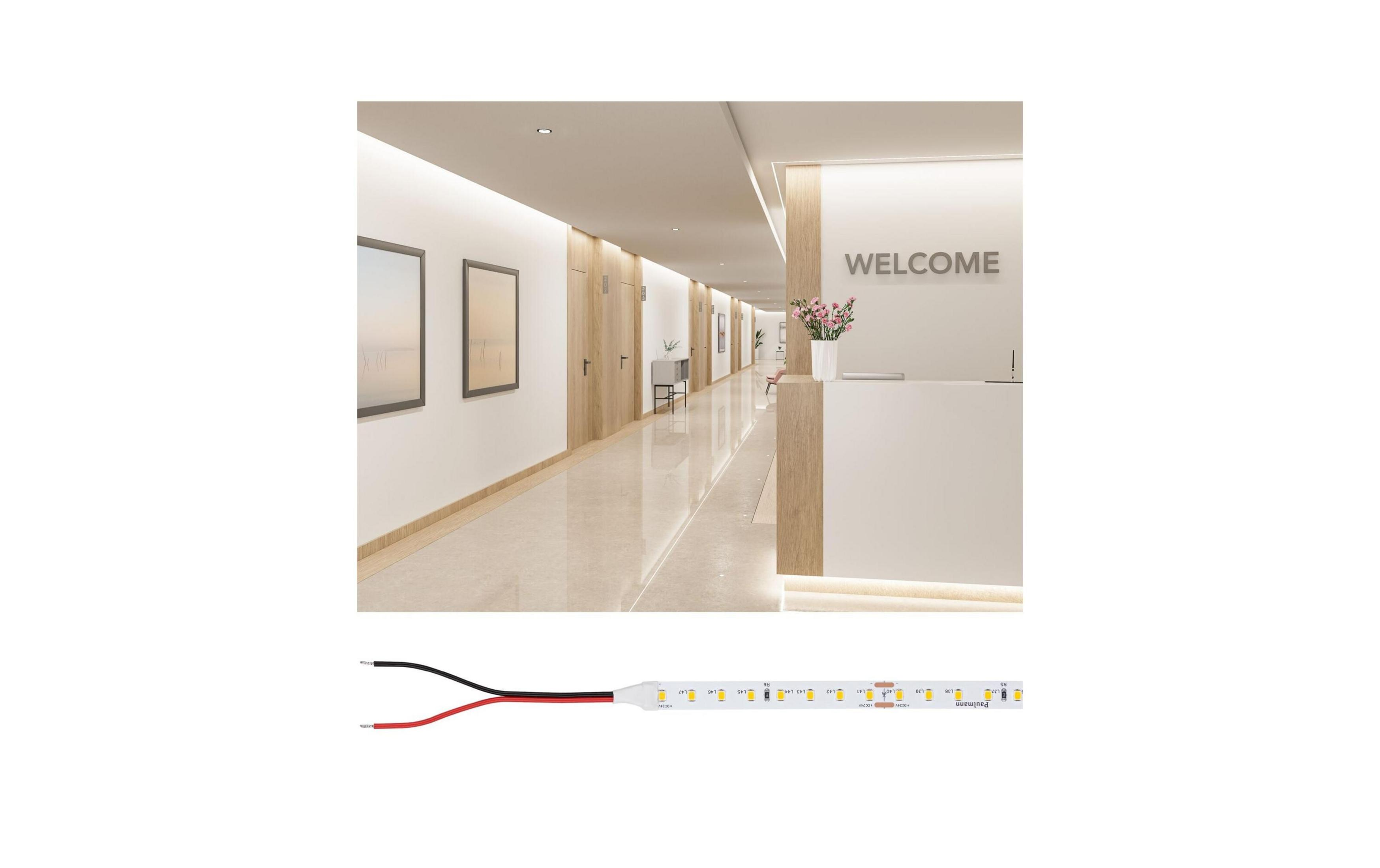 Korytarz z recepcją, napisem "Welcome" i taśmą LED.