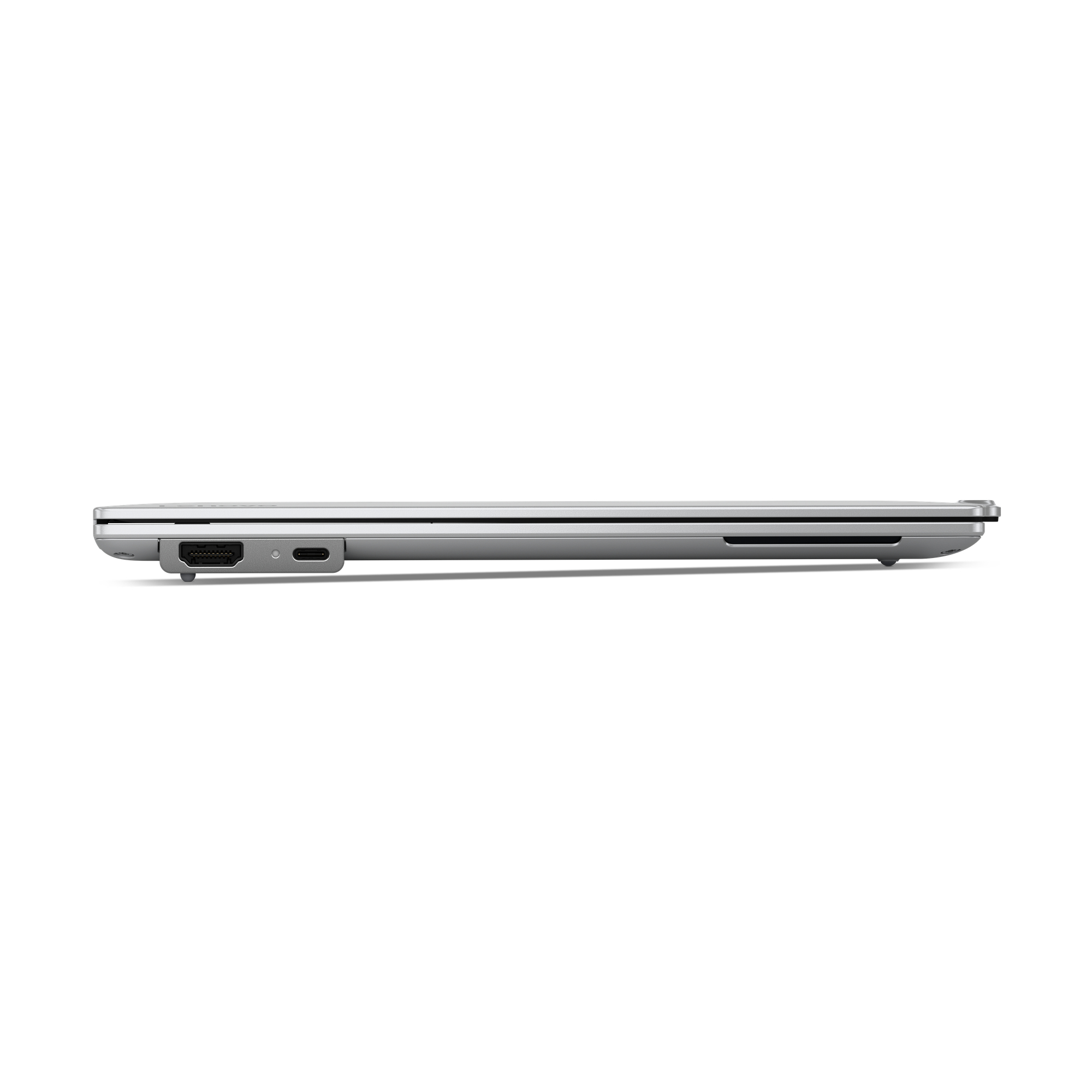 Laptop argentato con porte HDMI e USB-C sul lato.