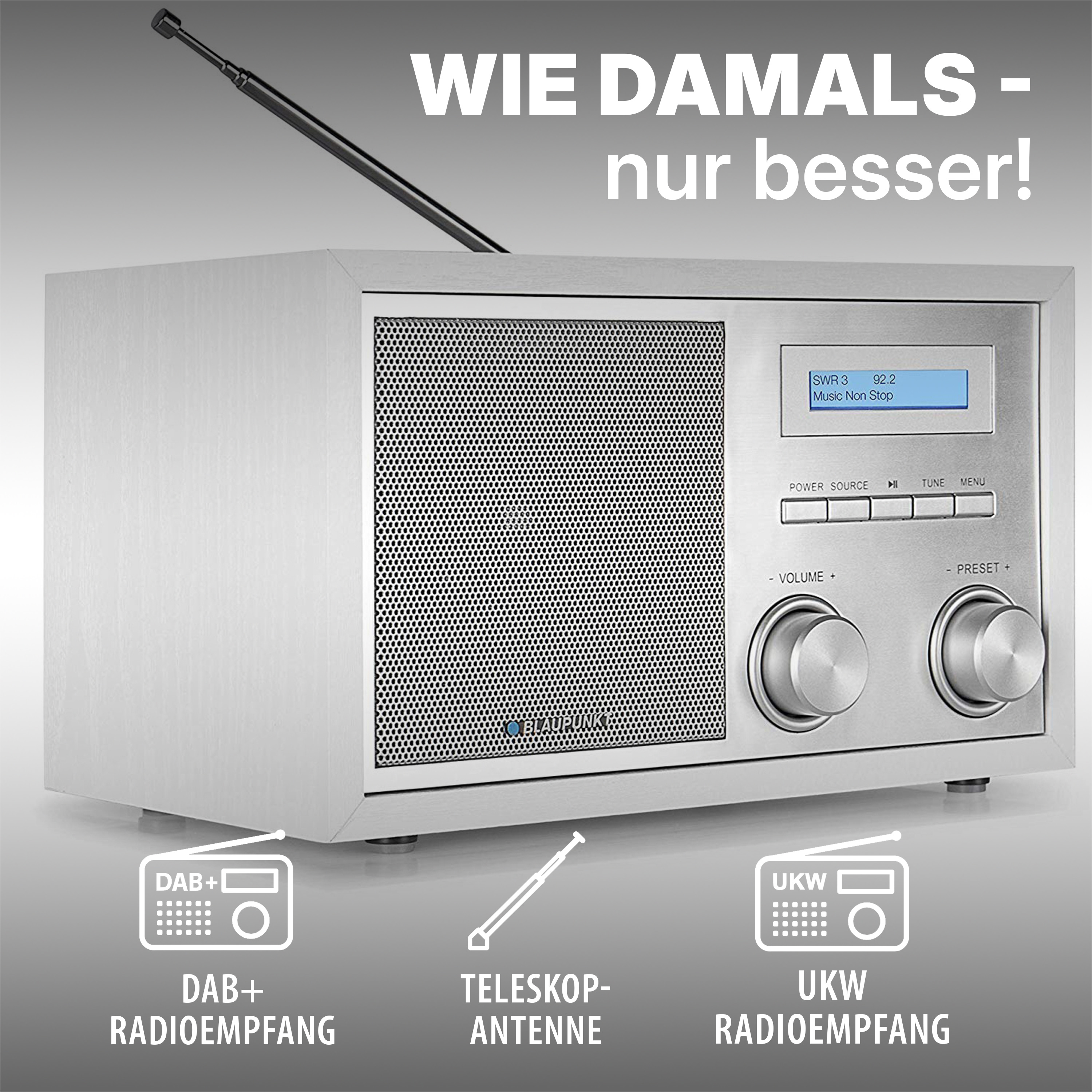 Ein silberner Radioempfänger mit silbernen Knöpfen und Antenne.