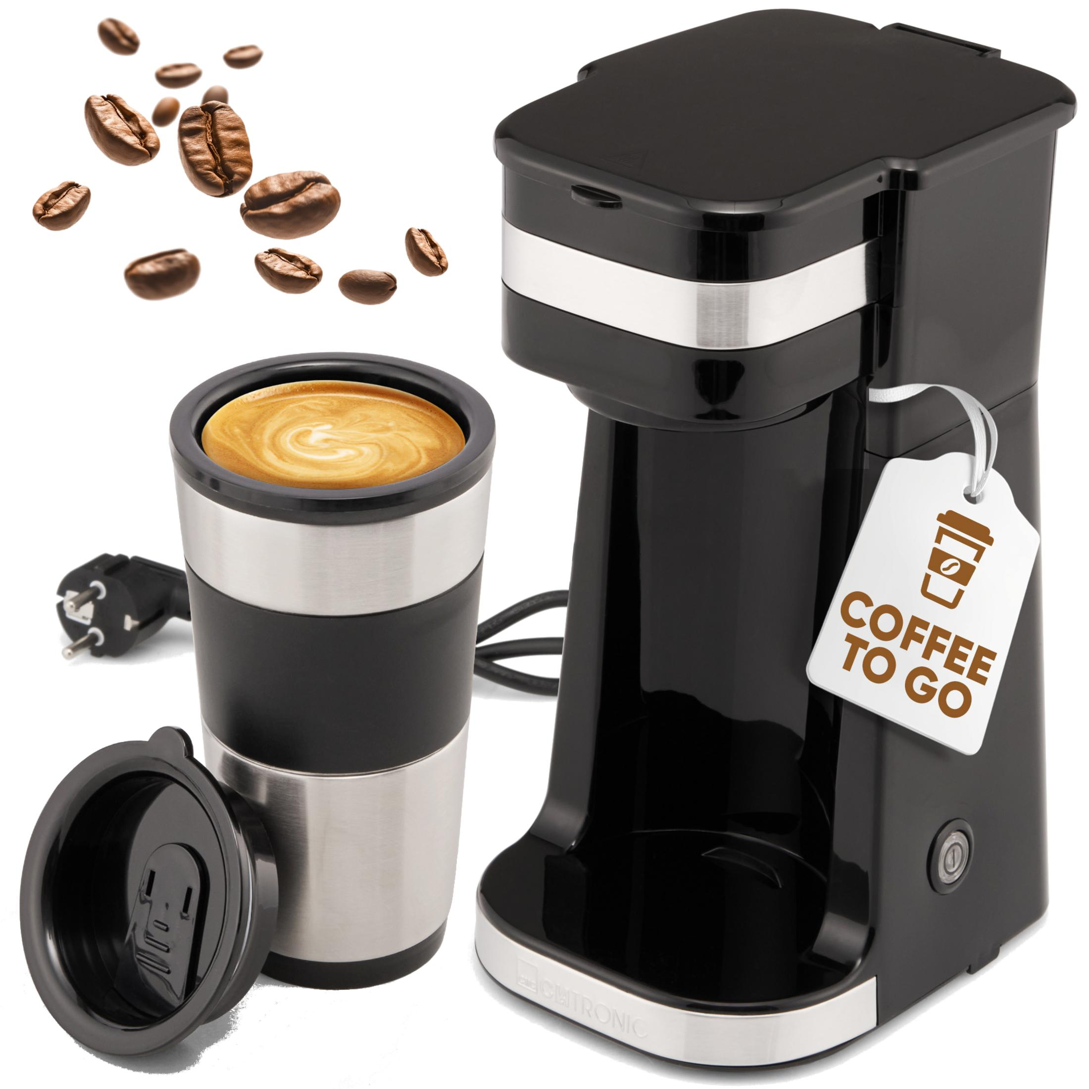 Czarna maszyna do kawy z kubkiem, ziarnami kawy i etykietą "Coffee to Go".