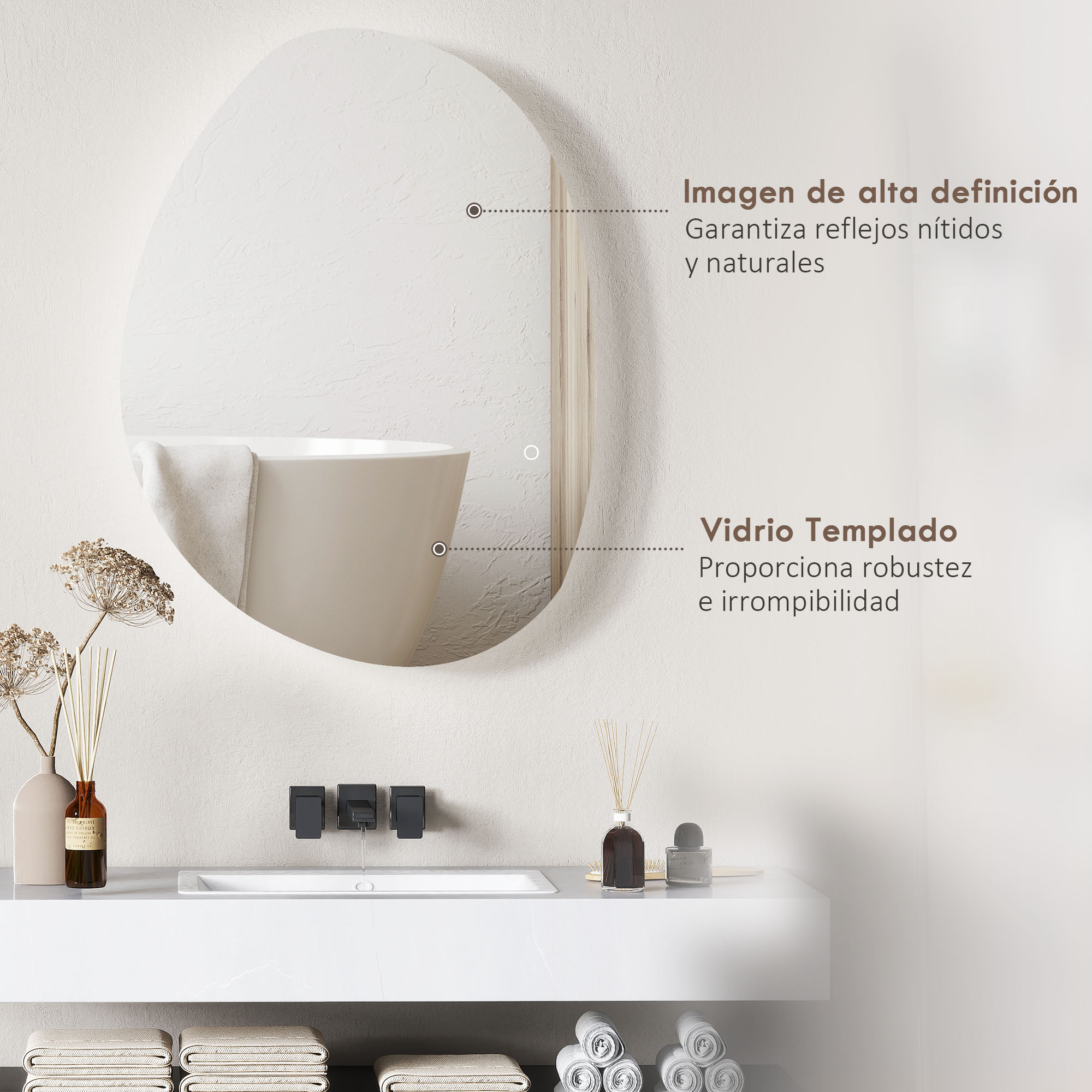 Un espejo sobre un tocador moderno con toallas y objetos decorativos.