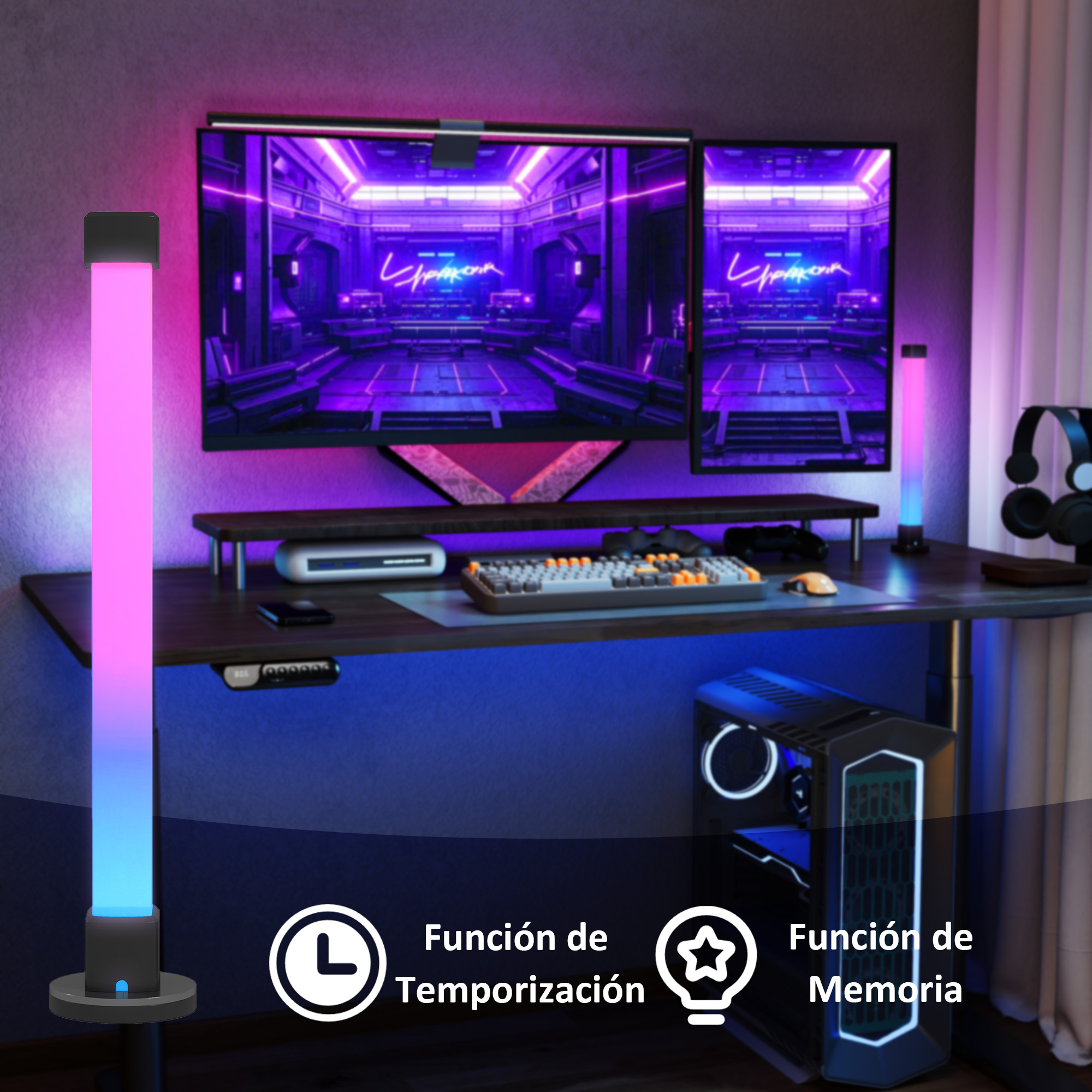Un escritorio gaming con dos monitores, teclado, ratón, PC e iluminación RGB.