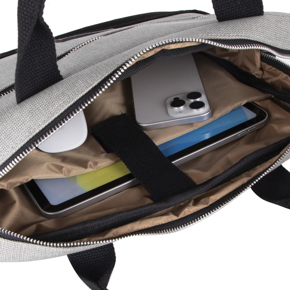 Telefon, tablet ve beyaz fareli gri çanta içi.