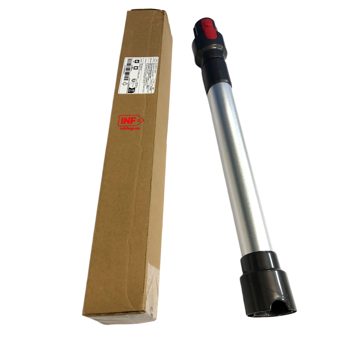 Srebrna rura odkurzacza z czarnym i czerwonym uchwytem obok brązowego kartonu.